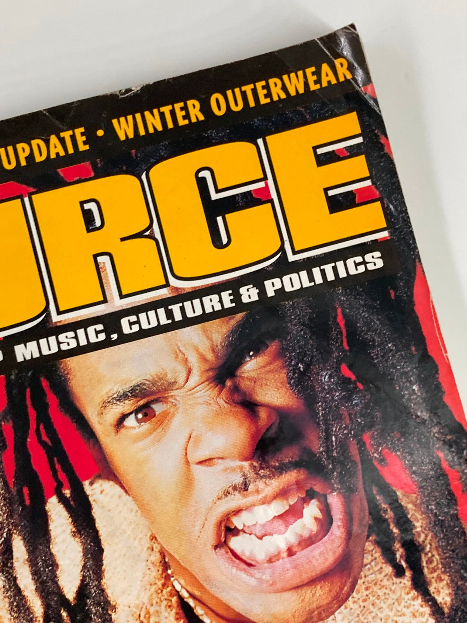 Top view of The Source Magazine November 1997, emphasizing the bold title and hip-hop culture themes with Busta Rhymes prominently featured.