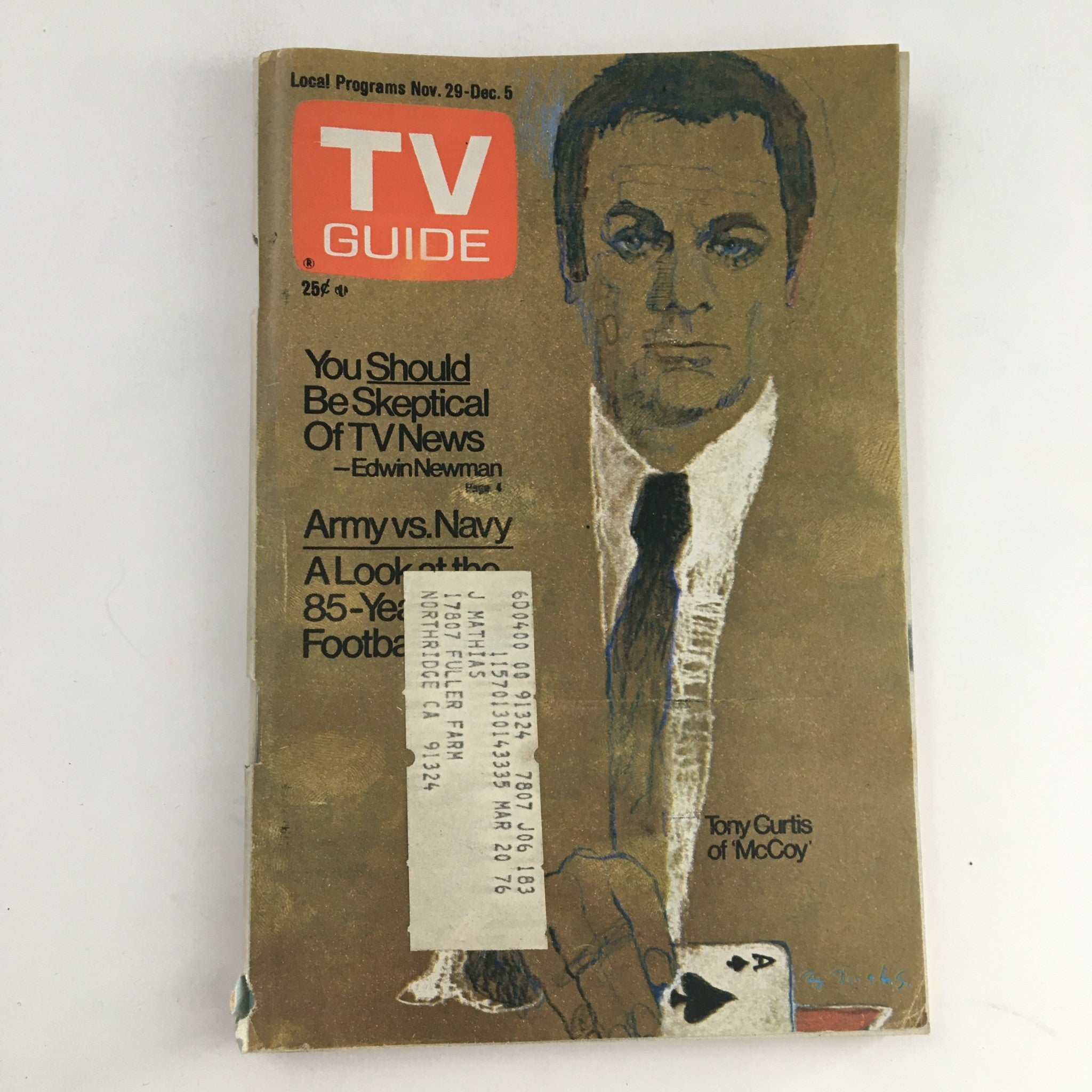 Cover of TV Guide Magazine dated November 29, 1975 featuring Tony Curtis of 'McCoy'. The magazine showcases local programs, articles, and advertisements from the mid-1970s, highlighting the era's television culture.