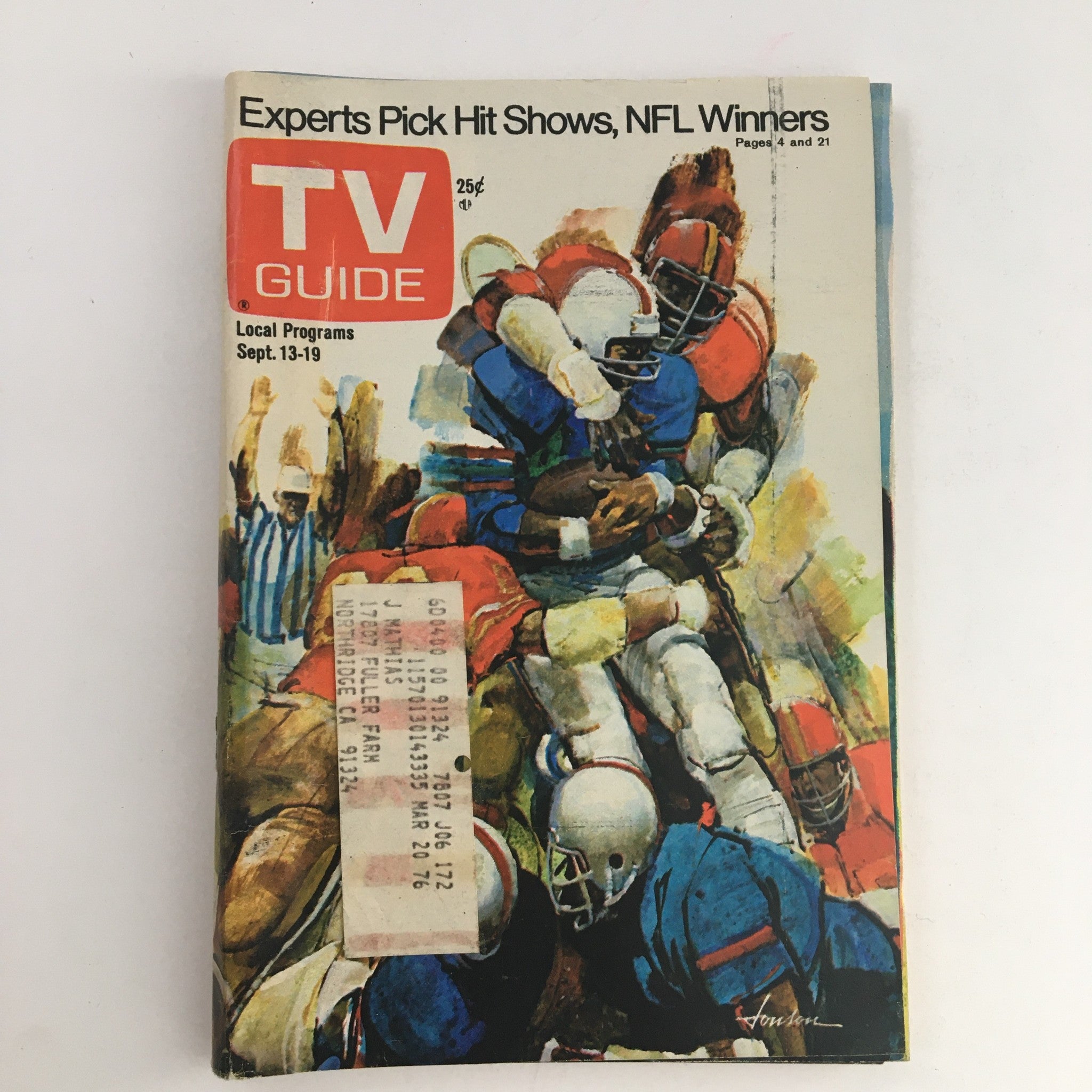 TV Guide Magazine September 13 1975 featuring artwork depicting NFL highlights and experts' picks of hit shows for local programs. The cover showcases a vibrant illustration of football players in action, reflecting the entertainment culture of the 1970s.