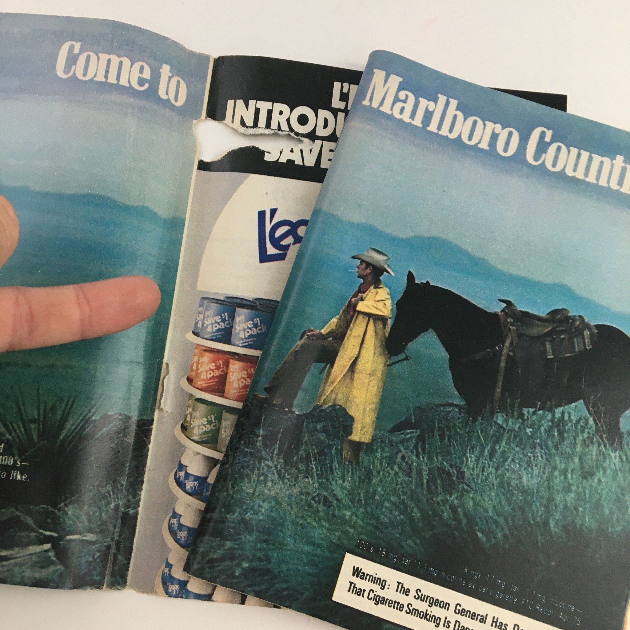 Cover of TV Guide Magazine September 13, 1975, featuring a Marlboro advertisement with a cowboy and horse in a scenic landscape.