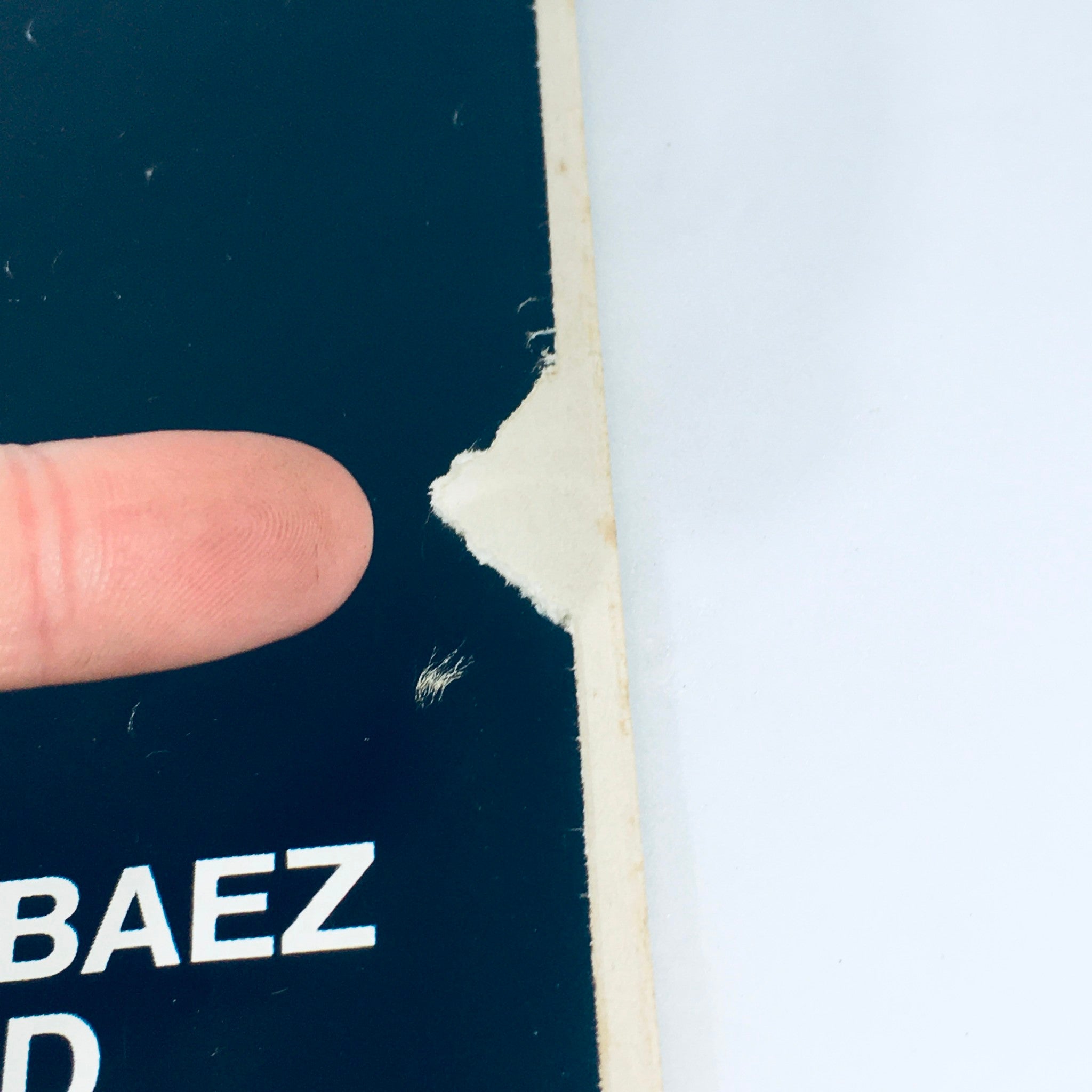 Close-up image of the Vintage Look Magazine cover dated May 5, 1970 showing a torn edge, highlighting the condition of the magazine featuring Joan Baez and David Harris.