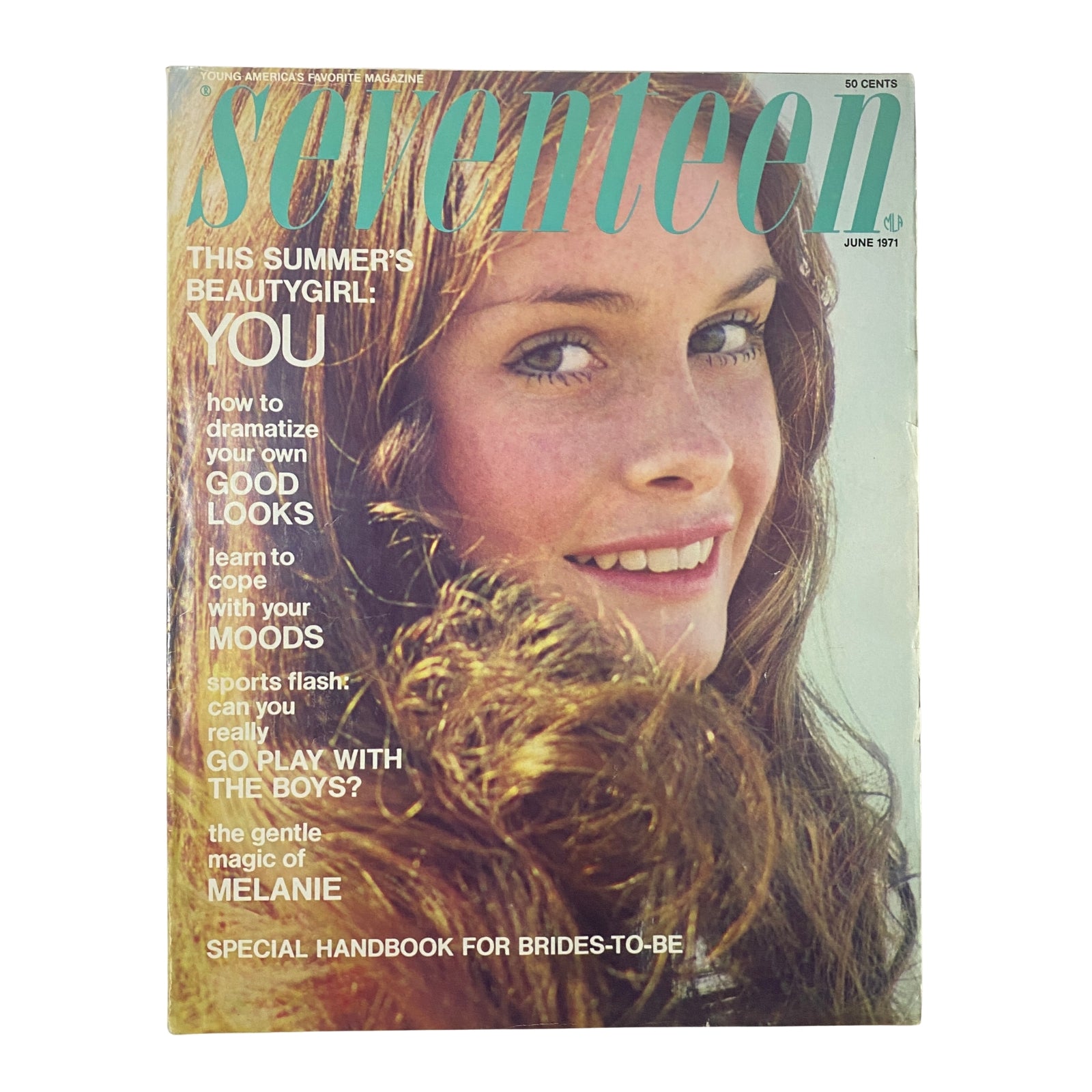 Seventeen Magazine June 1971 cover featuring a young woman with long brown hair and a bright smile, highlighting summer beauty tips and fashion; titled 'This Summer's Beauty Girl: You'.