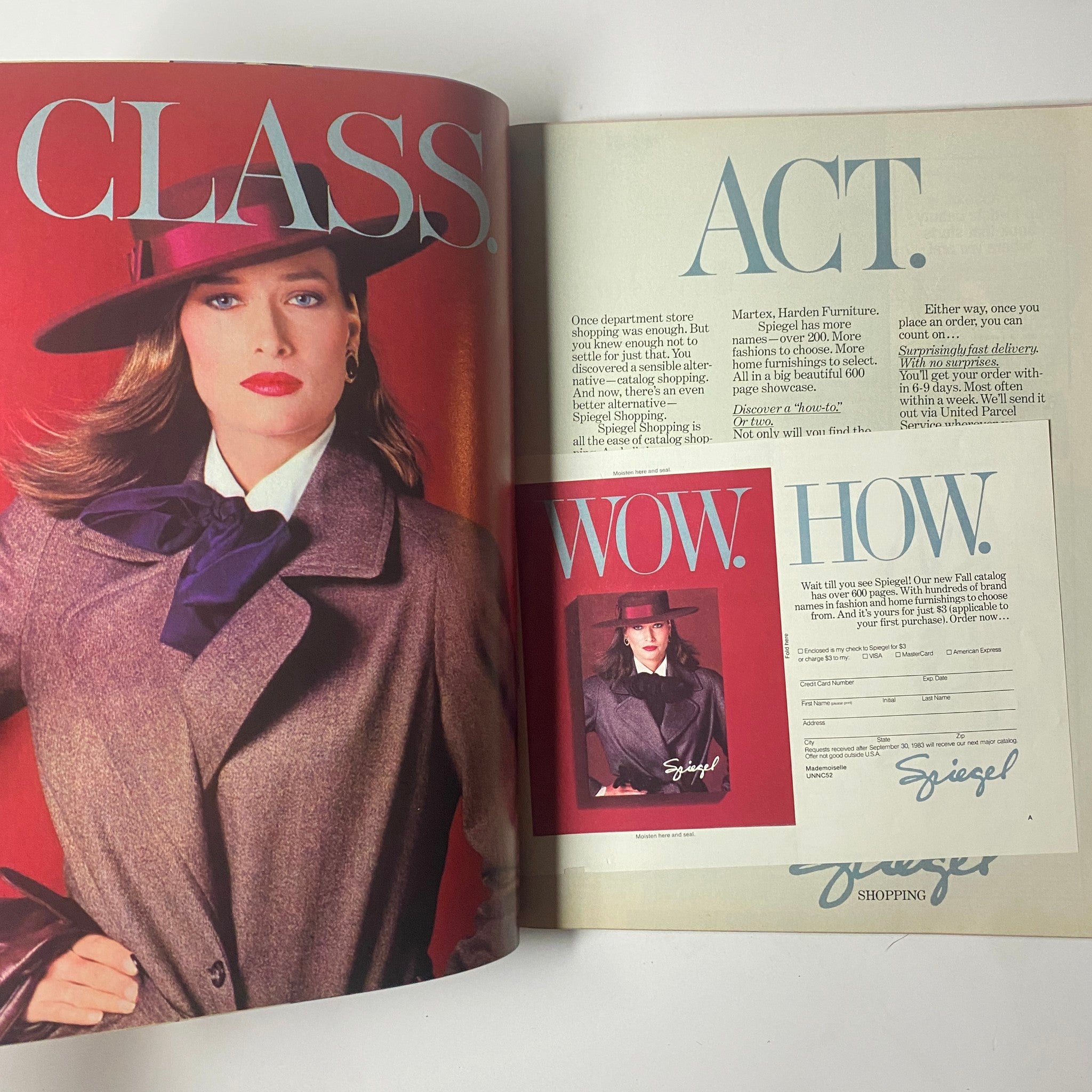 Page from Mademoiselle Magazine July 1983 featuring a fashion advertisement with a model in chic attire, promoting a stylish look with a hat and elegant coat, emphasizing contemporary shopping trends.