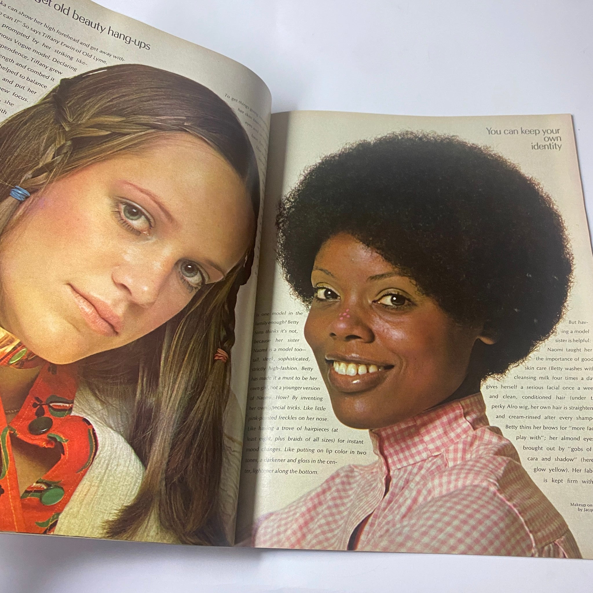 A two-page spread from Seventeen Magazine July 1971 showing two women with different hairstyles, emphasizing individuality and beauty.