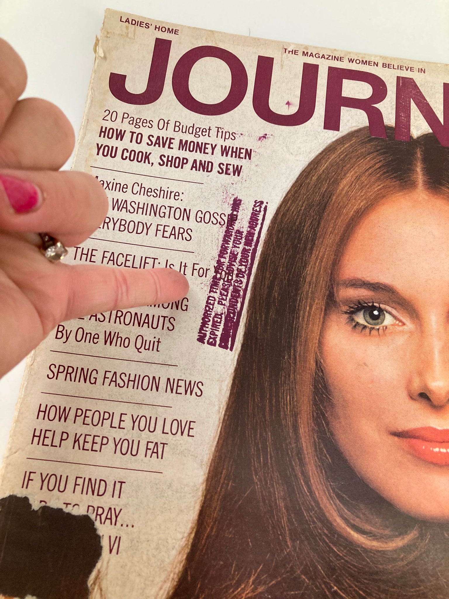 Detailed image of the cover of the March 1970 Ladies' Home Journal magazine highlighting the article 'Rebellion Among The Astronauts' and featuring a woman's portrait.