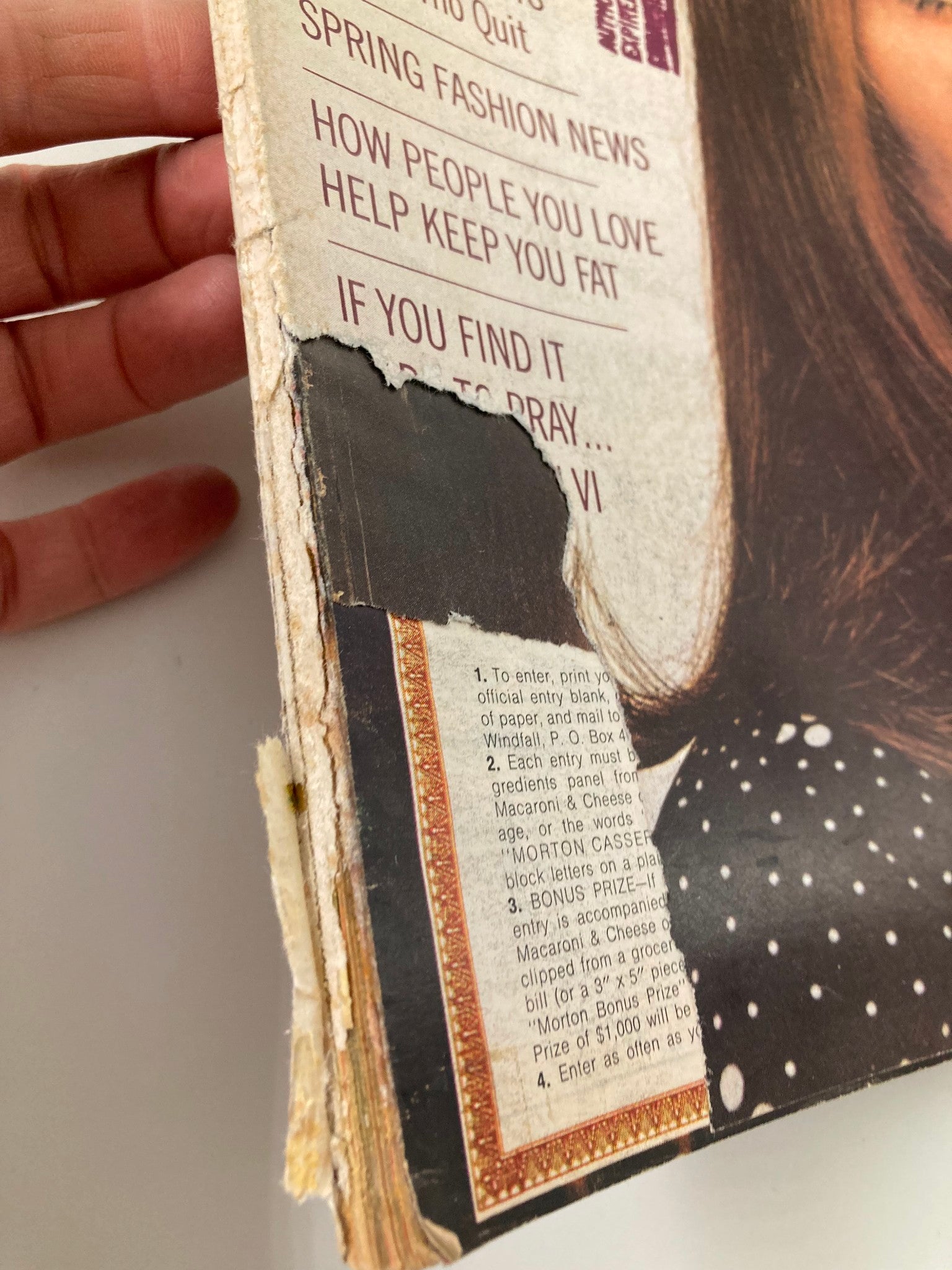 Image showing the damaged spine of the March 1970 Ladies' Home Journal magazine, with the title 'Rebellion Among The Astronauts' listed on the cover.