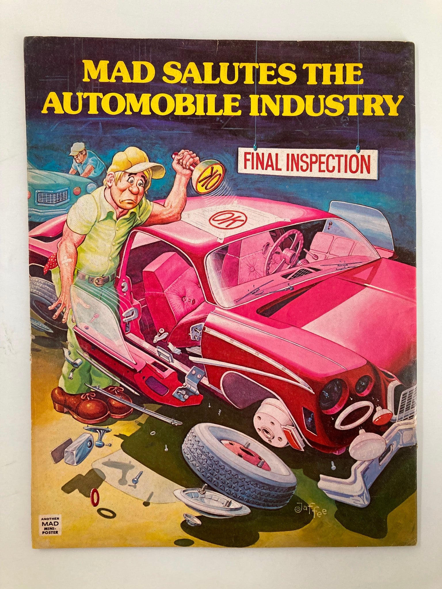 Poster related to Mad Magazine saluting the automobile industry, featuring humorous caricatures of mechanics and cars, adding to the comedic spirit of Mad Magazine April 1977 No. 190.