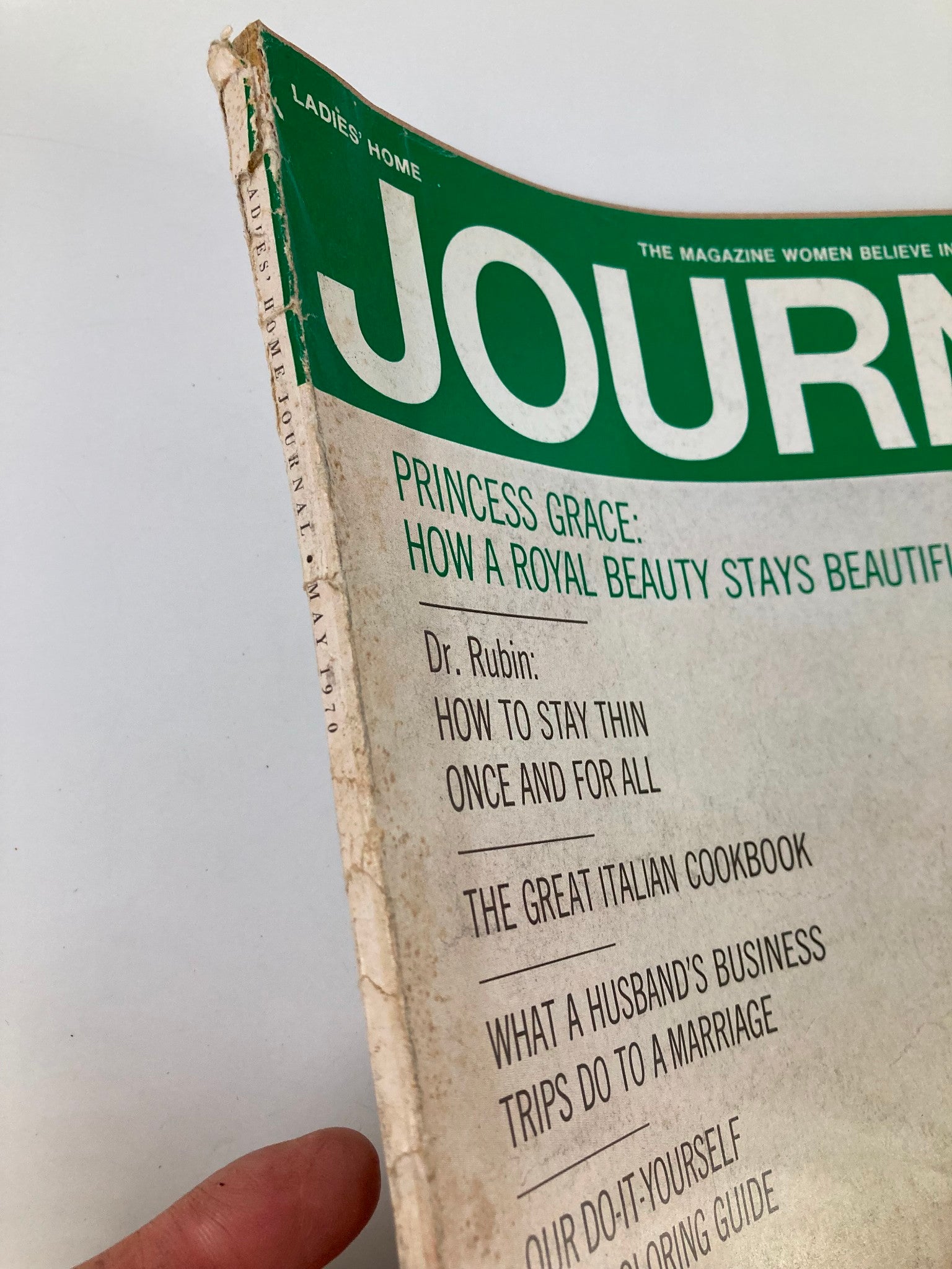 Close-up of the spine and top of the cover of Ladies' Home Journal Magazine May 1970, highlighting the title and article teaser for "How a Royal Beauty Stays Beautiful".