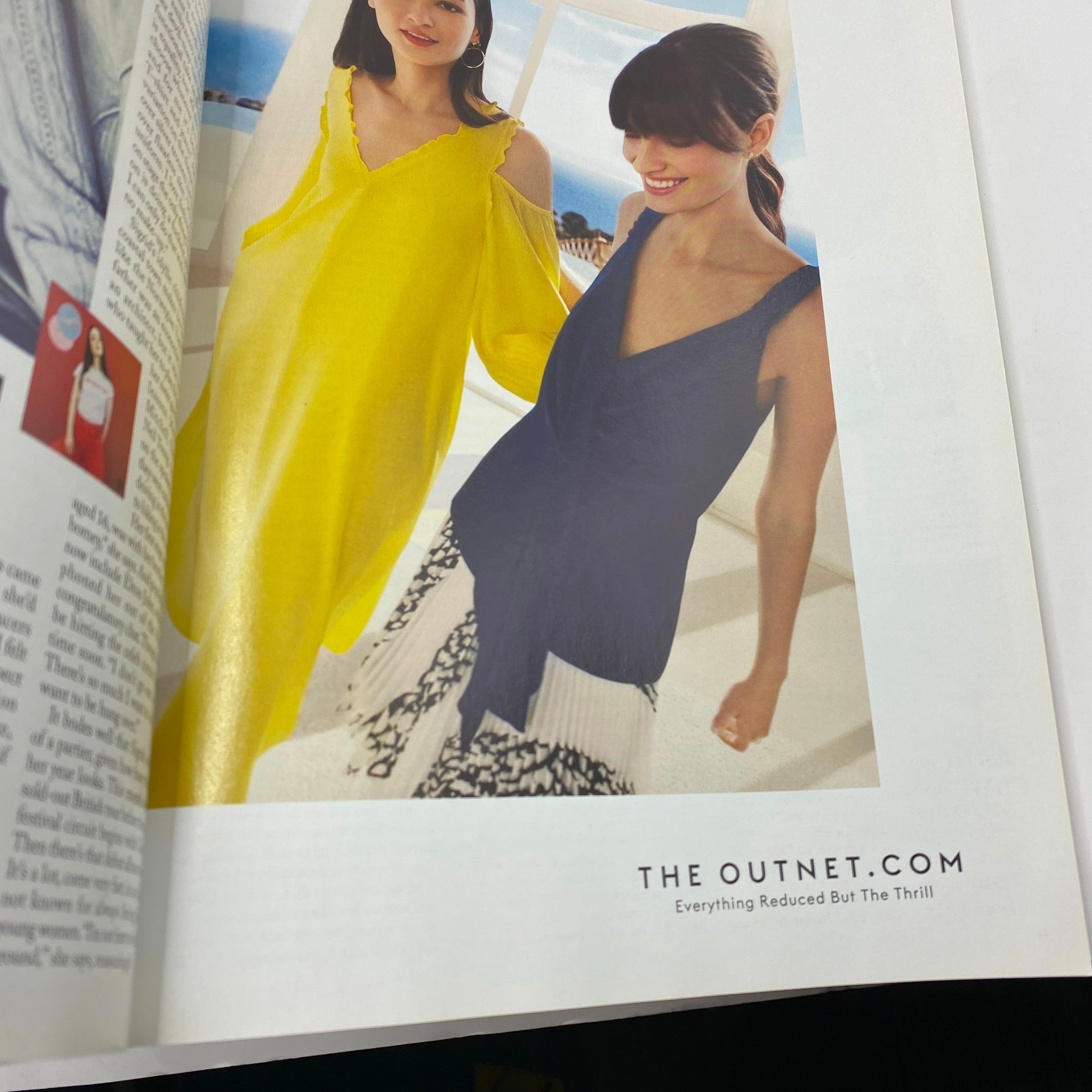 Fashion advertisement page in British Vogue UK Magazine April 2018, displaying stylish clothing from The Outnet, emphasizing modern fashion trends.