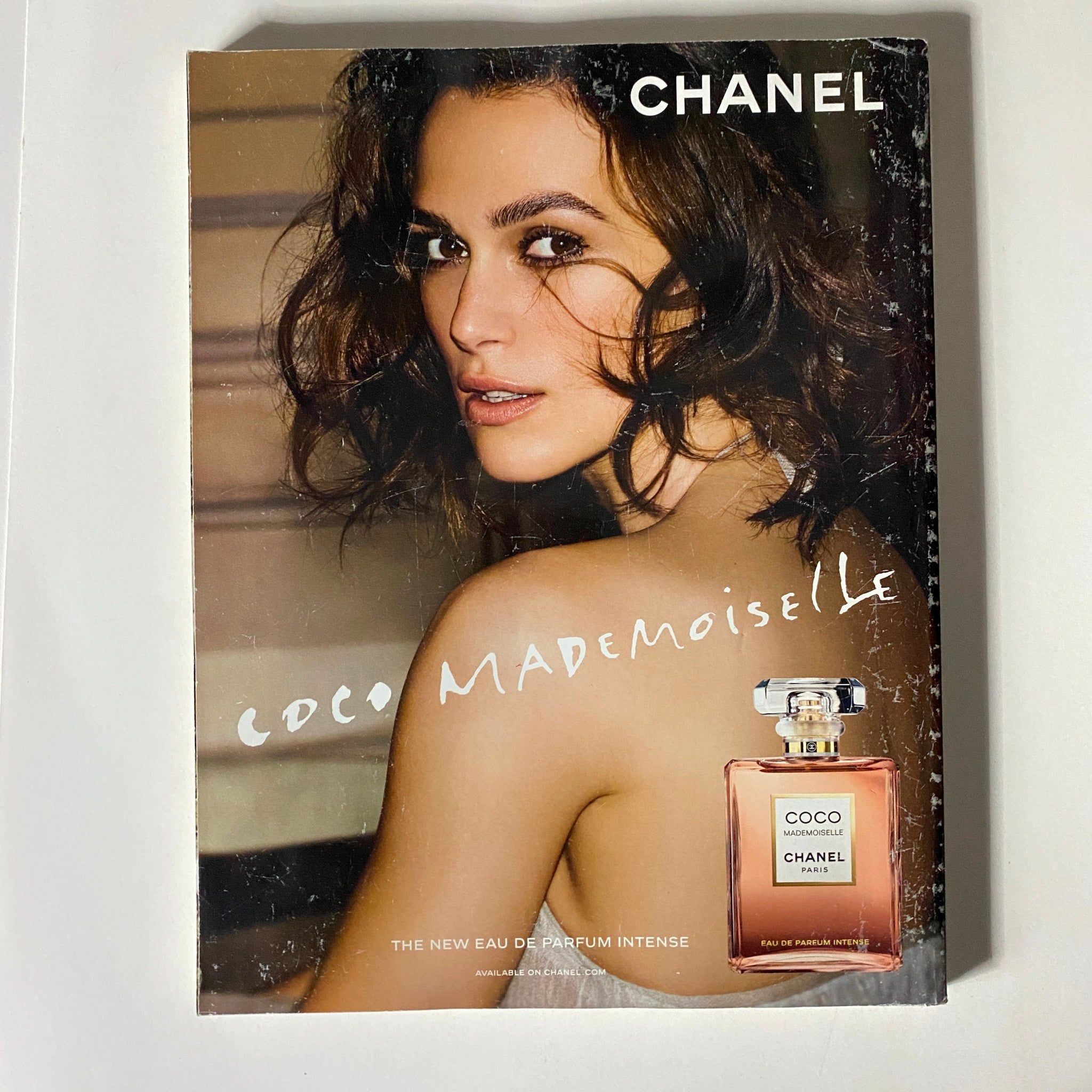 Coco Mademoiselle perfume advertisement in British Vogue UK Magazine April 2018, featuring a model promoting the Chanel fragrance in an elegant setting.