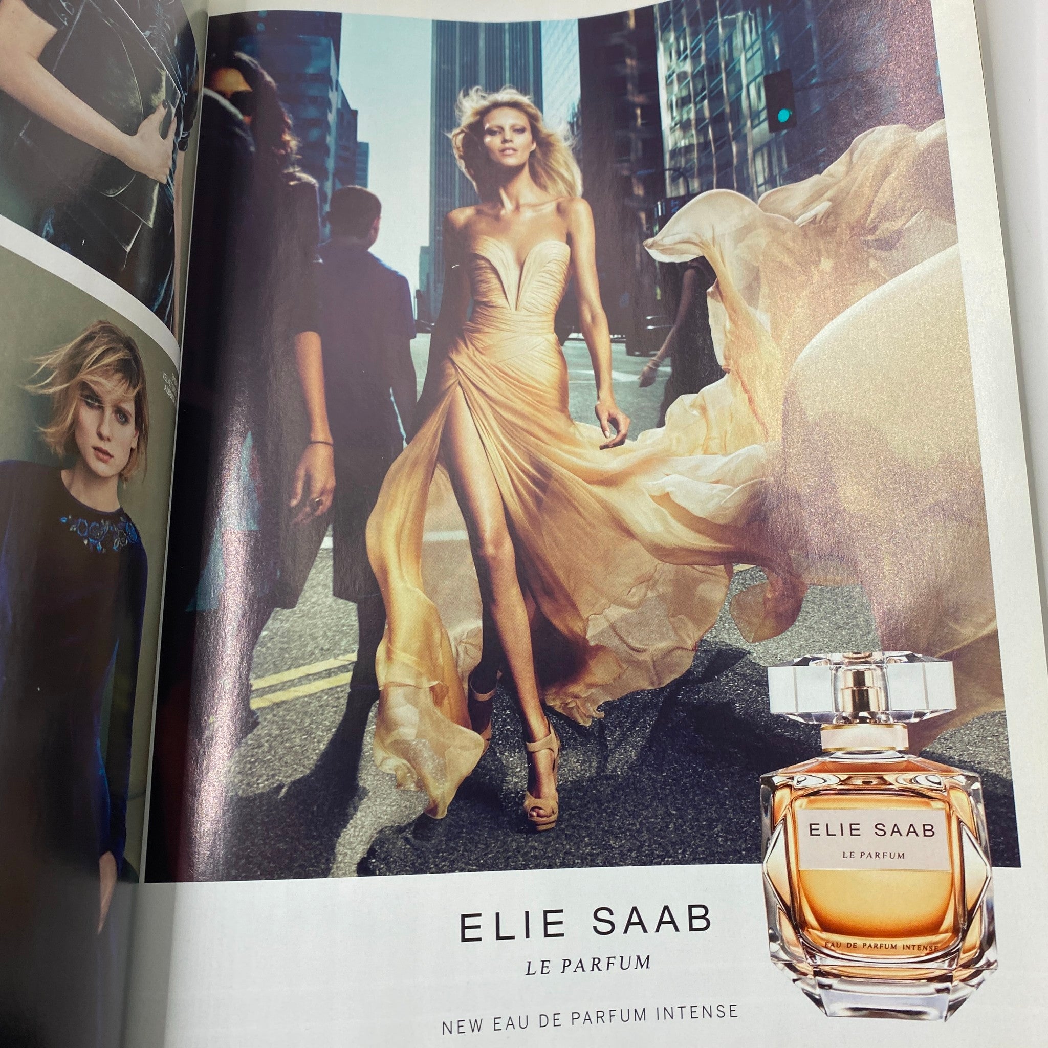 Fashion advertisement for Elie Saab Le Parfum from British Vogue UK Magazine October 2013, featuring a stunning model in a flowing gown.