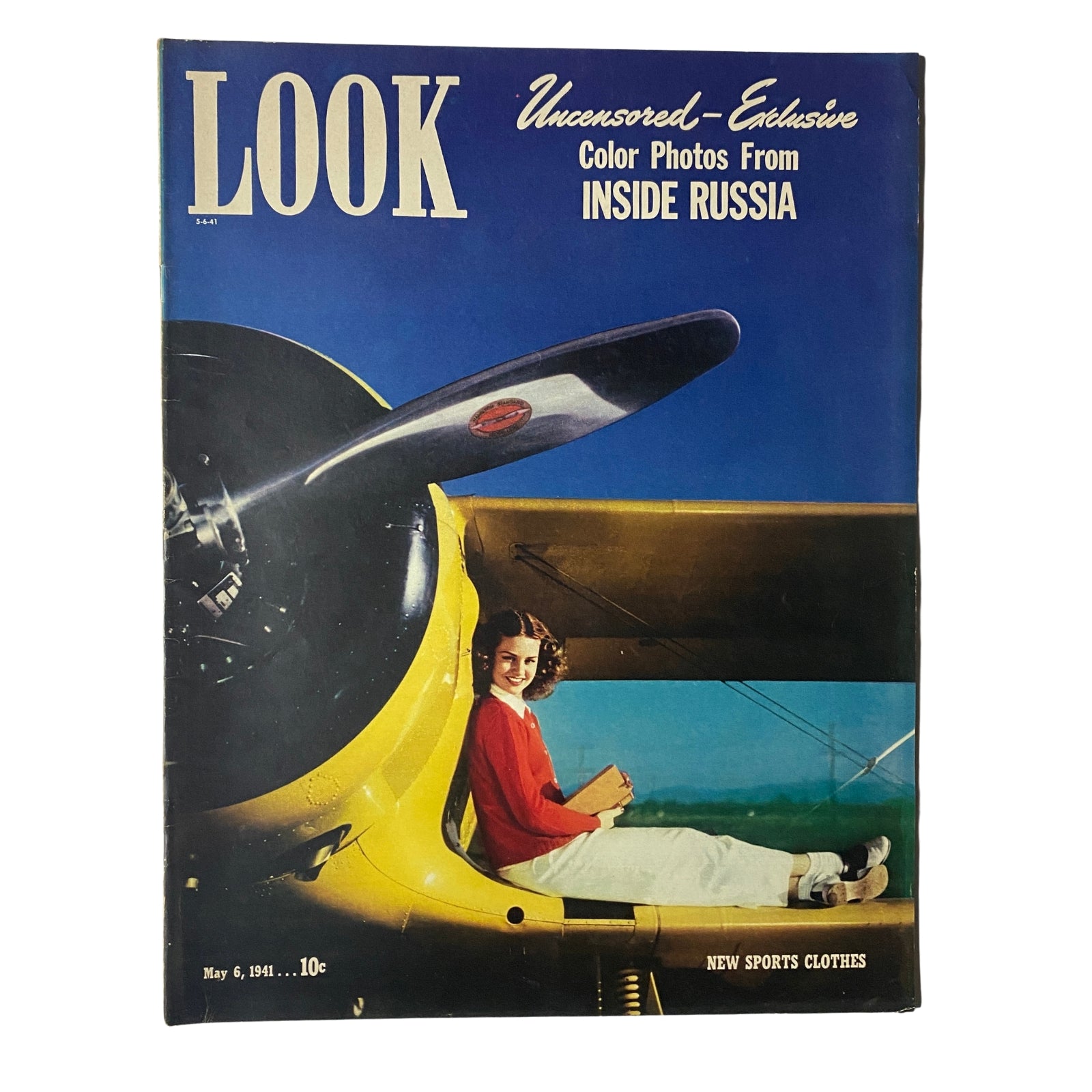 Cover of Look Magazine from May 6, 1941 featuring Anita Sympson next to a Beechcraft biplane, showcasing vintage aviation aesthetics.