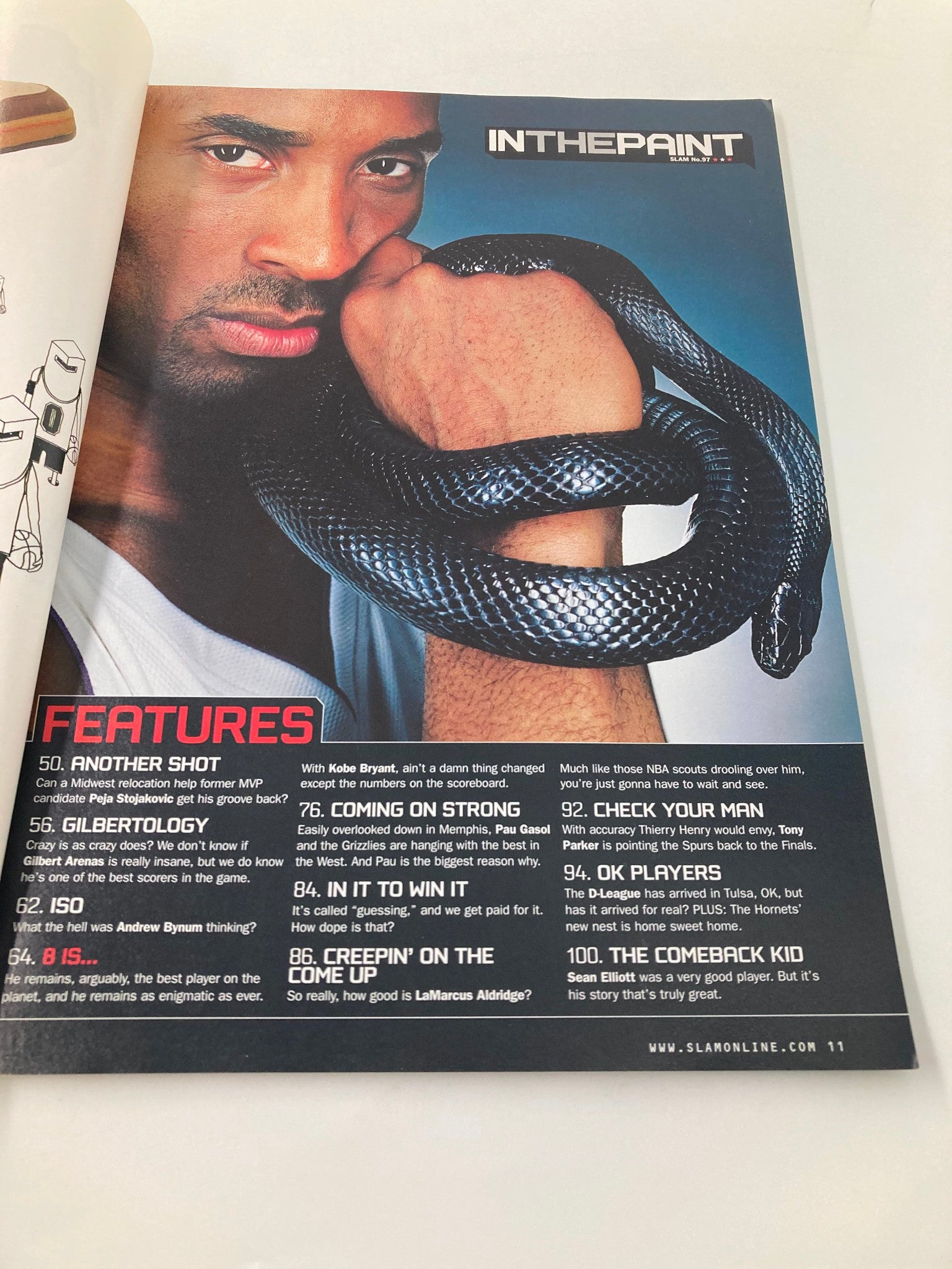 Inside page of Slam Magazine May 2006 with Kobe Bryant, the Cold Blooded Black Mamba, holding a snake, showcasing magazine features.