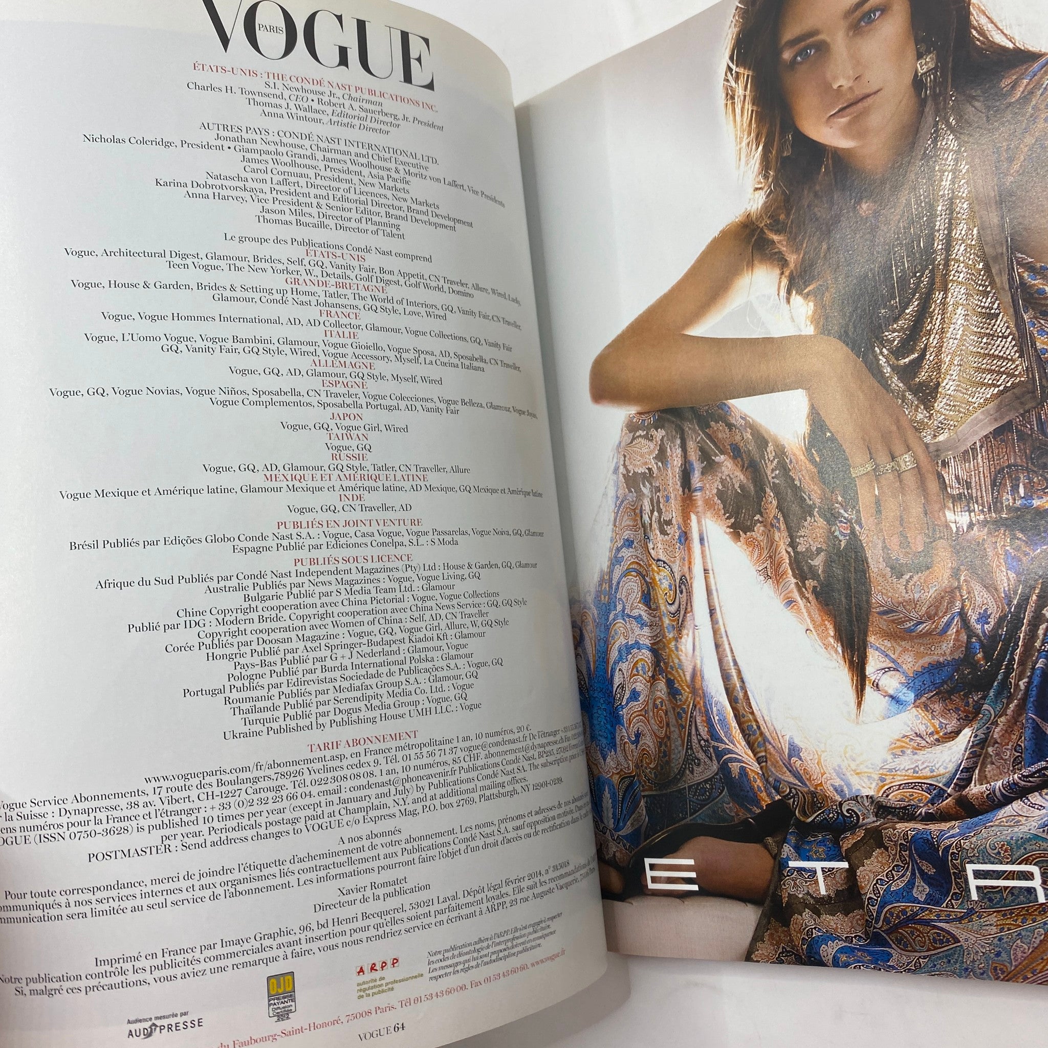 Inside page of Vogue Paris Magazine February 2014 showcasing editorial content and fashion details.