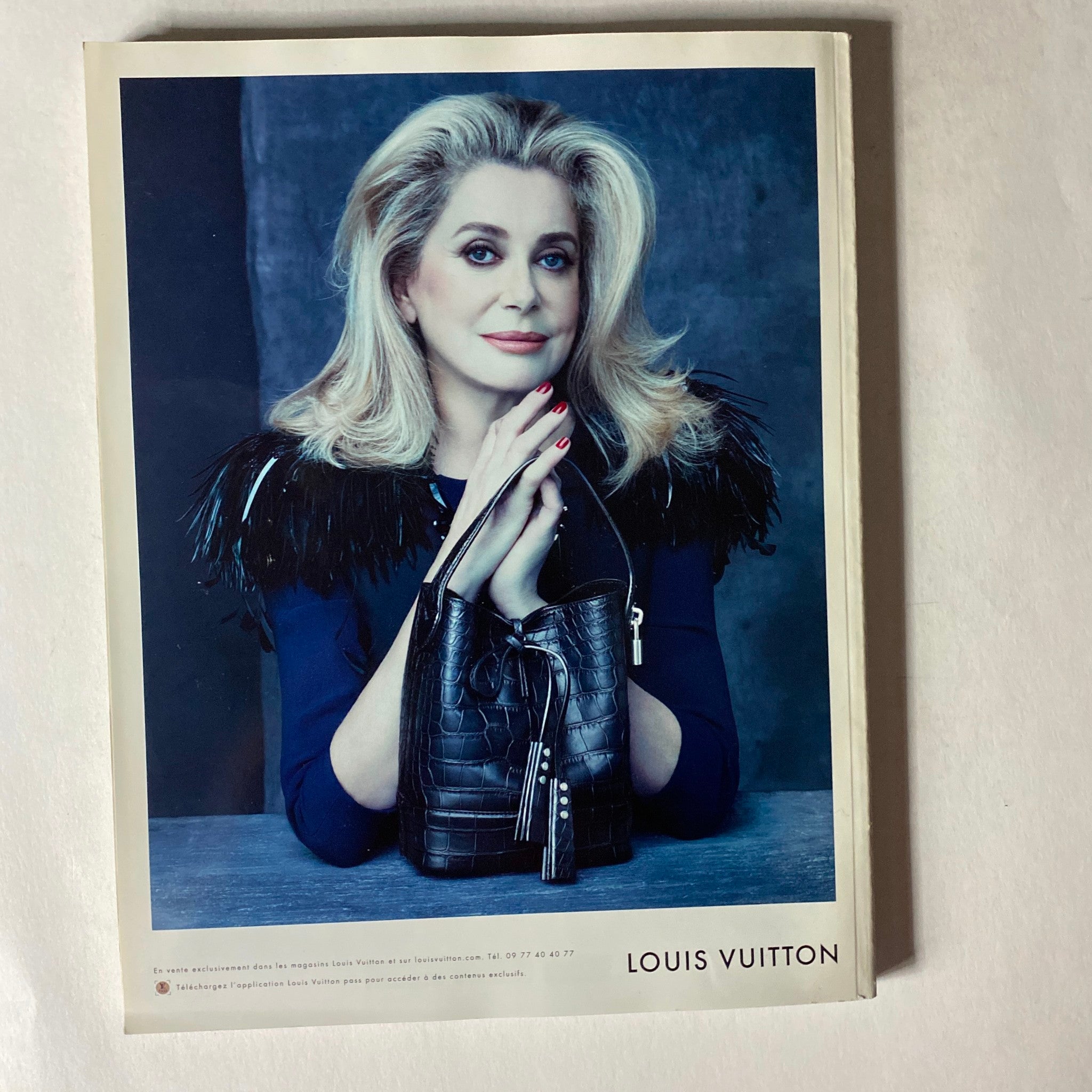 Vogue Paris Magazine February 2014 featuring Emily DiDonato on the cover, showcasing high-fashion elegance, style, and beauty.