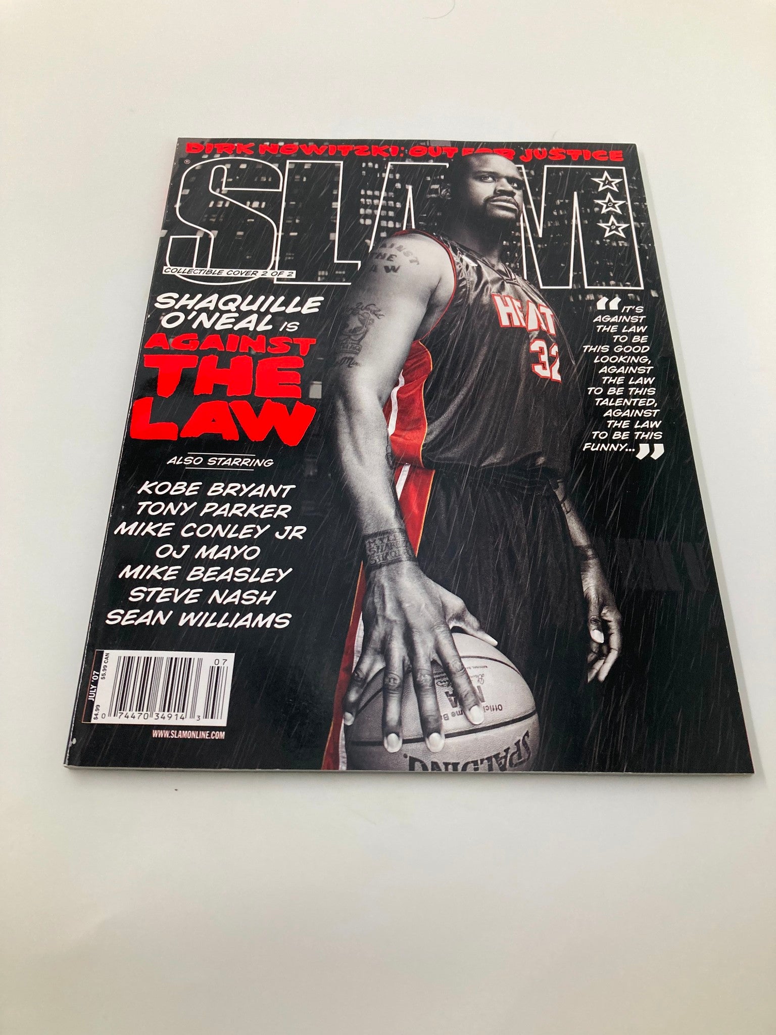 Slam Magazine July 2007 featuring Shaquille O'Neal of the Miami Heat on the cover with a basketball, showcasing an iconic moment in NBA history.