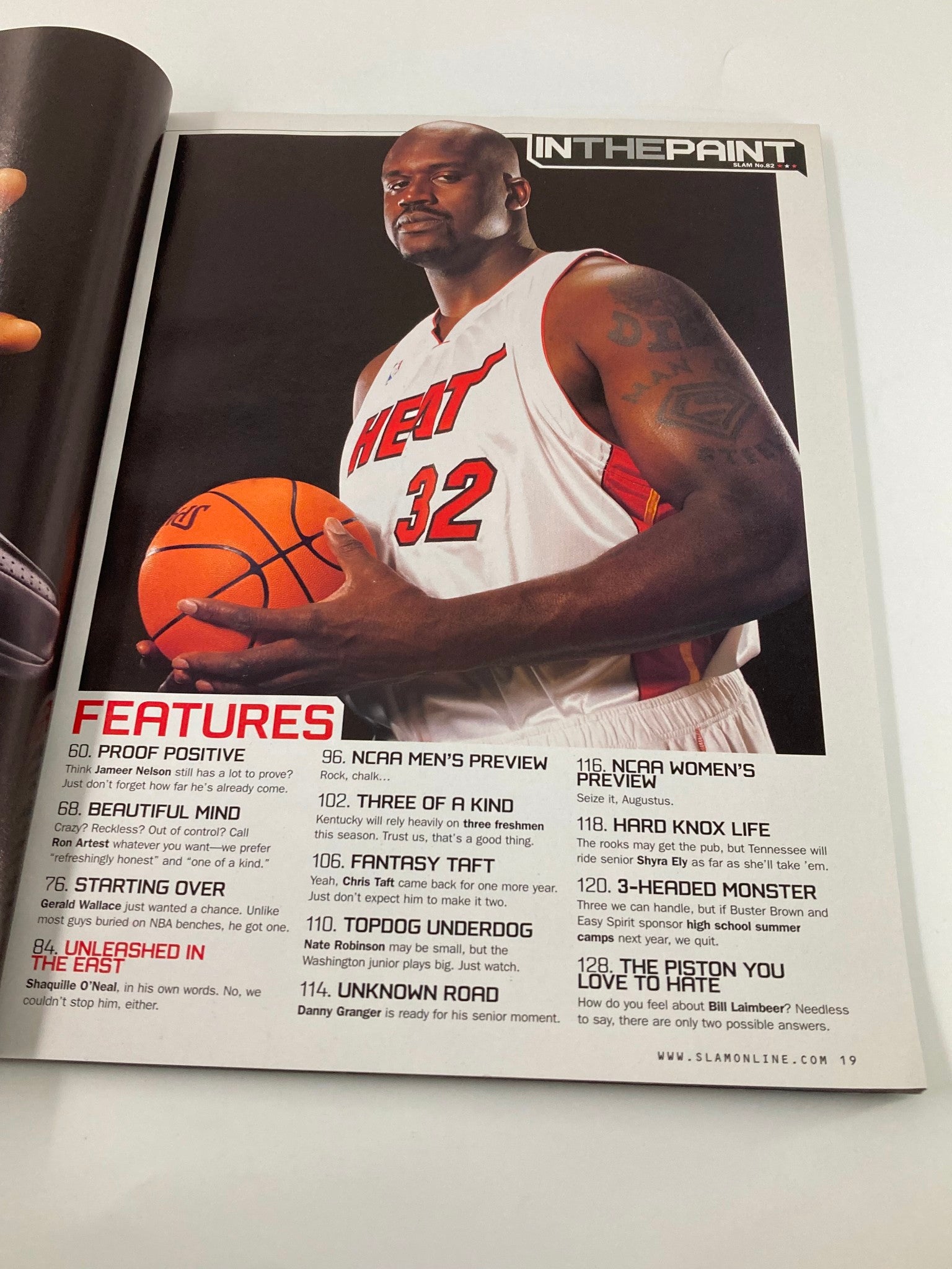 Inside page of Slam Magazine November 2004 highlighting features, with a photo of Shaquille O'Neal in his Miami Heat jersey holding a basketball, showcasing his impact in that season.