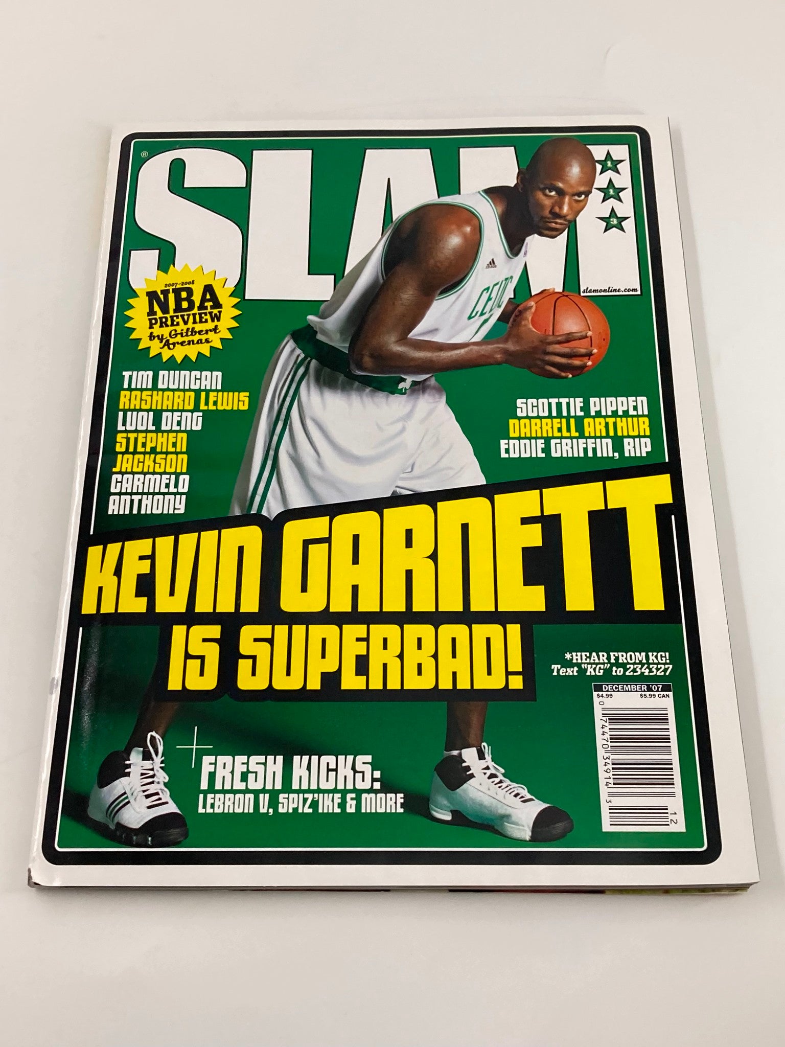 Slam Magazine December 2007 featuring NBA star Kevin Garnett on the cover, emphasizing his iconic status as a Boston Celtic with bold text declaring 'Kevin Garnett is Superbad!'. A must-have for sports enthusiasts.