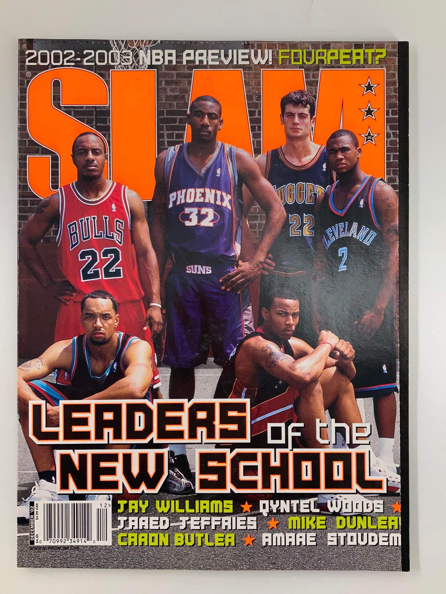 Slam Magazine December 2002 cover featuring basketball players Jay Williams, Donyell Marshall, Jared Jeffries, Caron Butler, and Amar'e Stoudemire, titled 'Leaders of the New School'.
