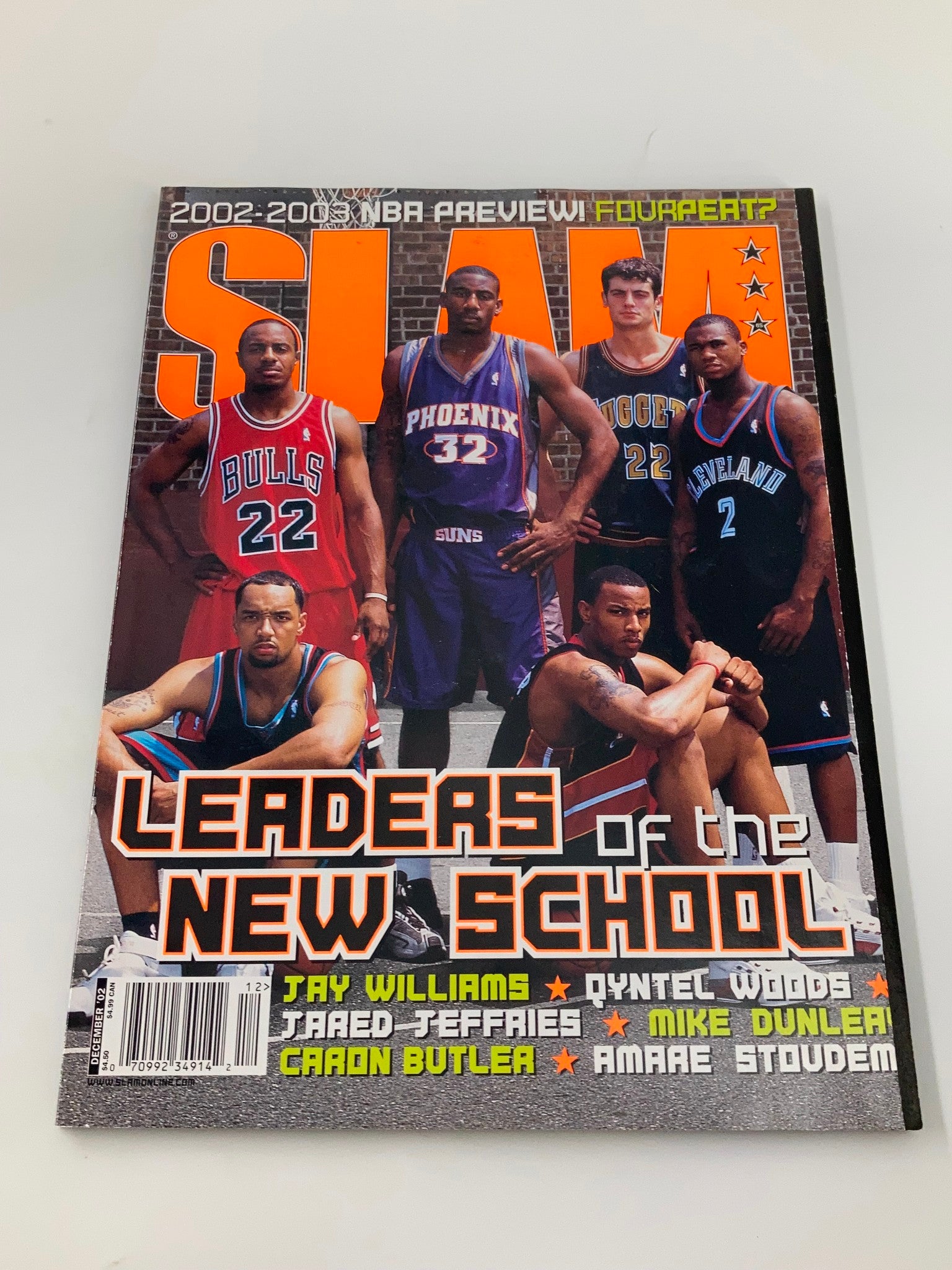 Slam Magazine December 2002 cover highlighting key basketball figures Jay Williams, Donyell Marshall, Jared Jeffries, Caron Butler, and Amar'e Stoudemire, with the headline 'Leaders of the New School'.