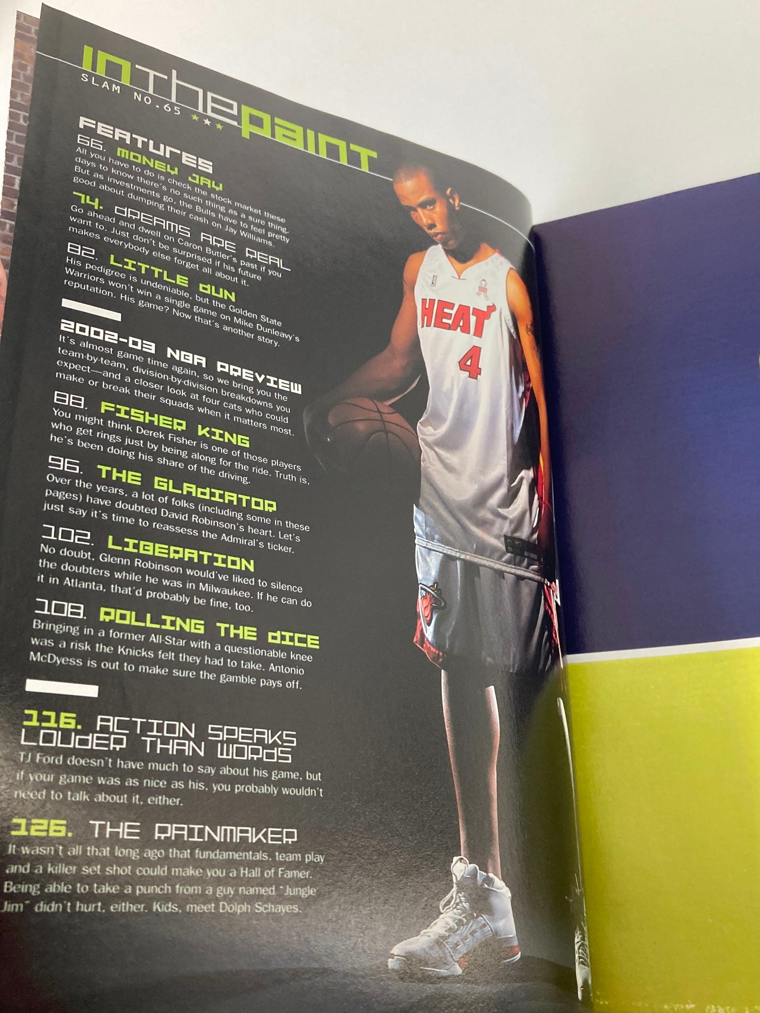 Inside page of Slam Magazine December 2002 displaying an article titled 'In the Paint' featuring an NBA player in a Miami Heat jersey, discussing various basketball features.