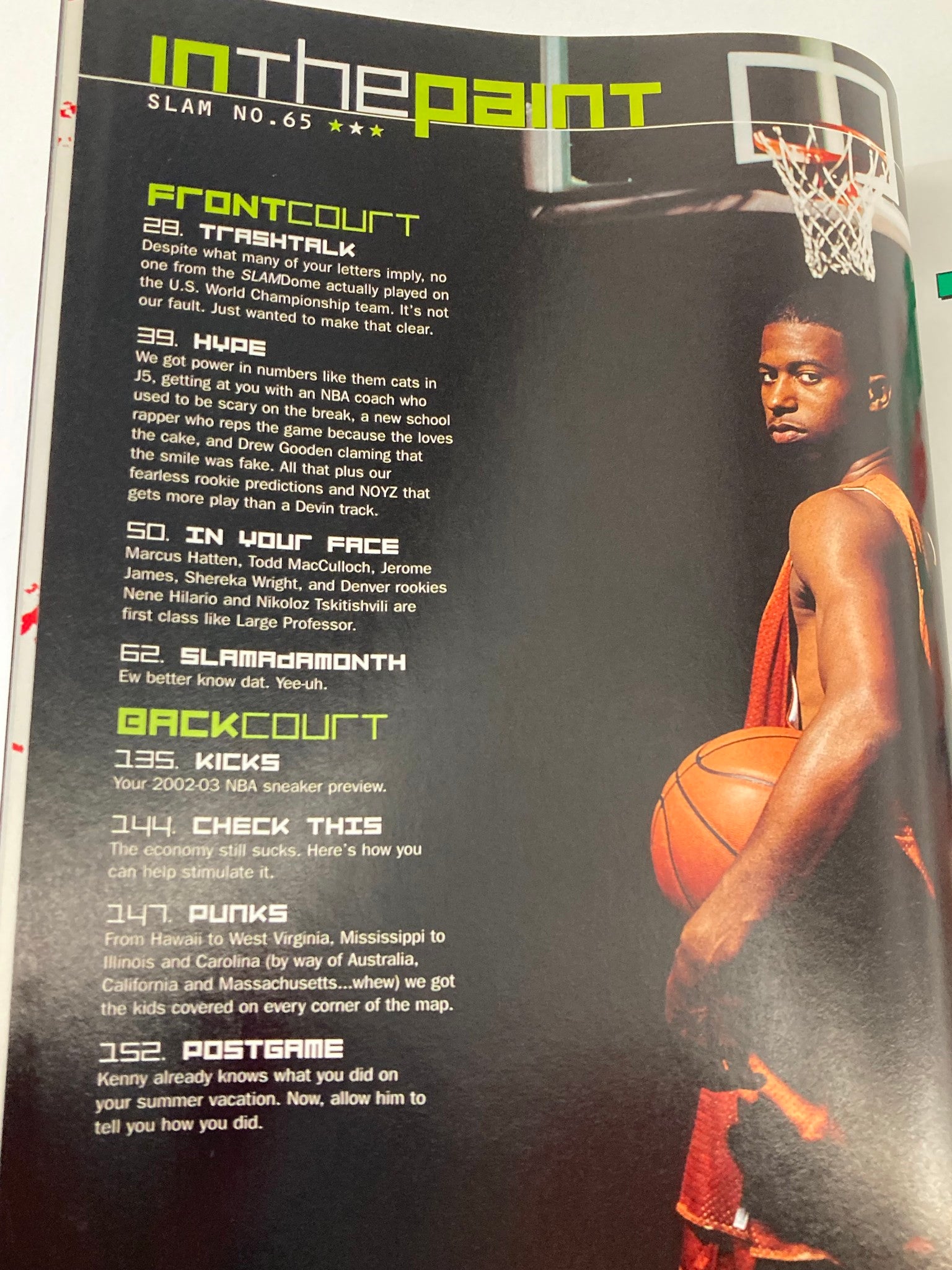 Inside page of Slam Magazine December 2002 showing an article titled 'In the Paint' featuring a basketball player with a ball, discussing insights on the NBA.