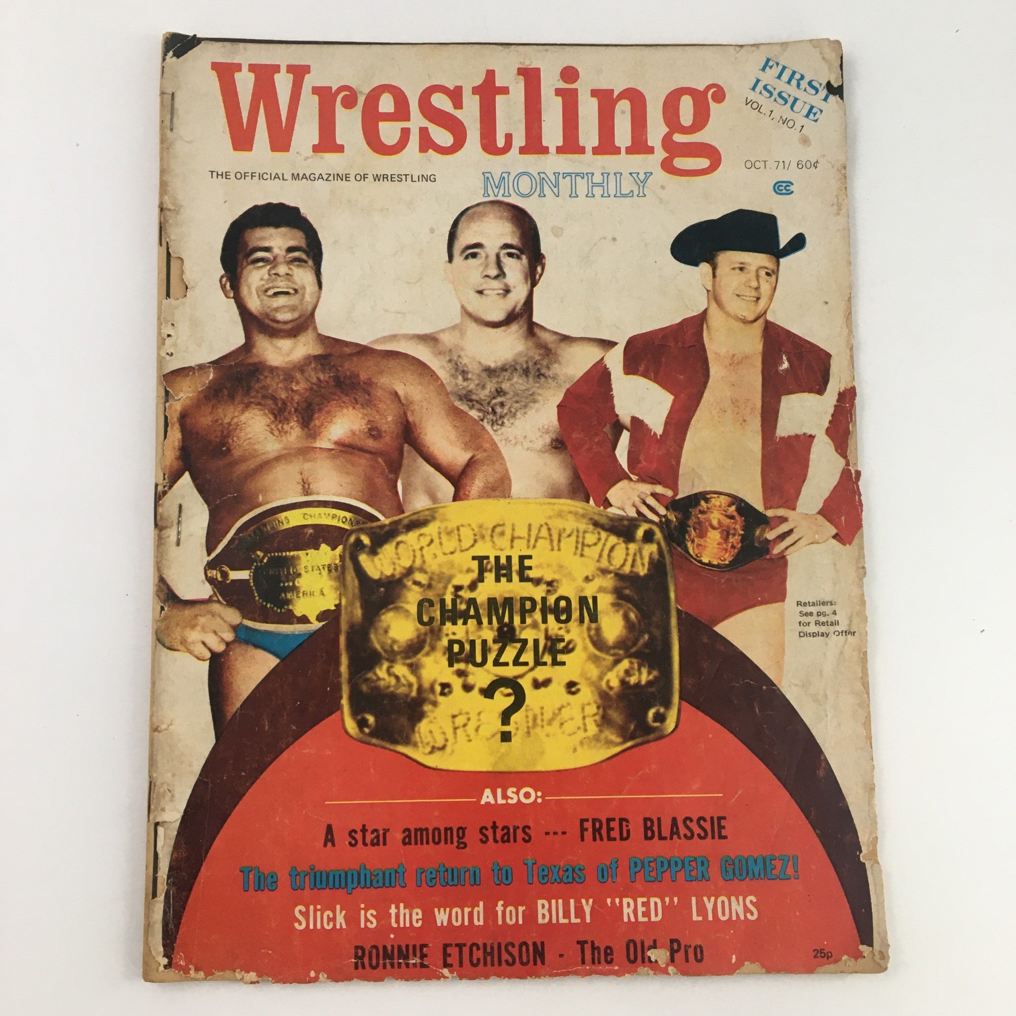 Wrestling Monthly Magazine October 1971 featuring Fred Blassie and Ronnie Etchison. The magazine cover shows wrestling champions with belts, promoting articles about legendary wrestlers. First issue of this vintage collectible publication.