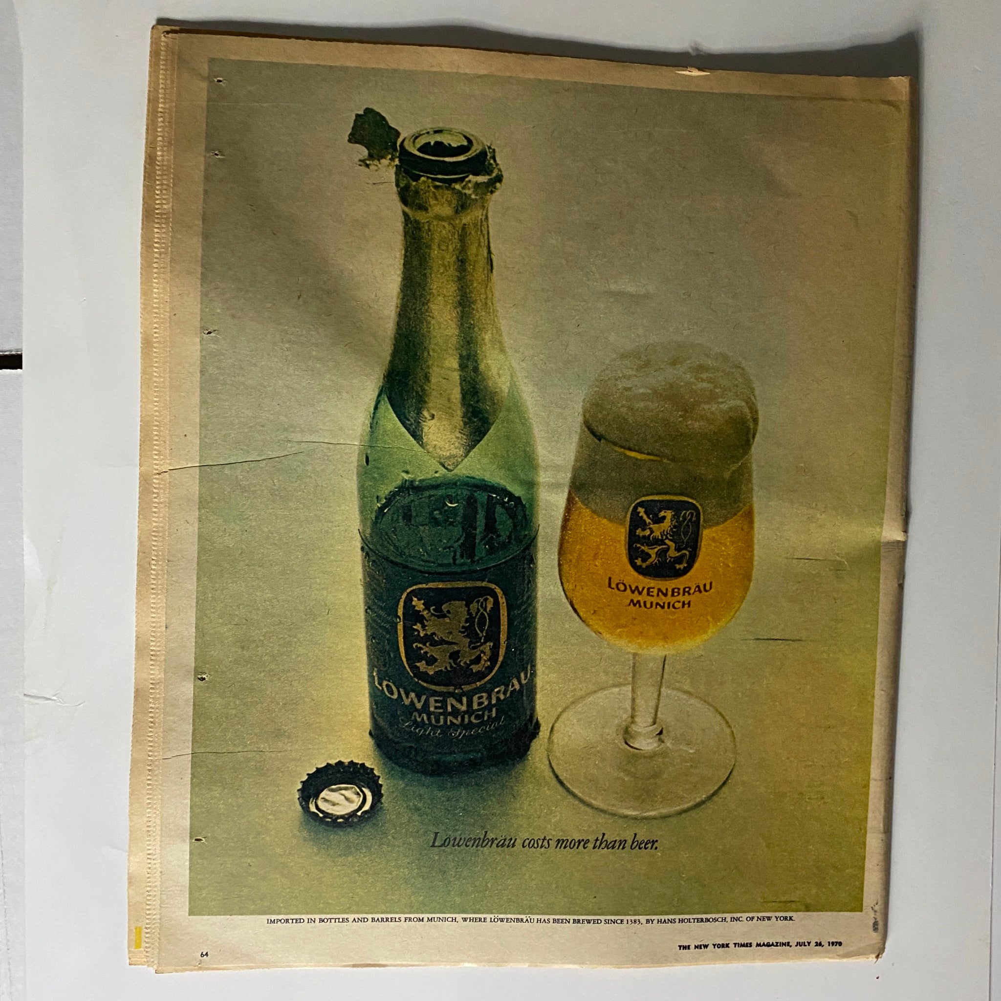 Image of The New York Times Magazine from July 26, 1970, featuring a Löwenbräu beer bottle and a glass of beer, showcasing vintage advertising.
