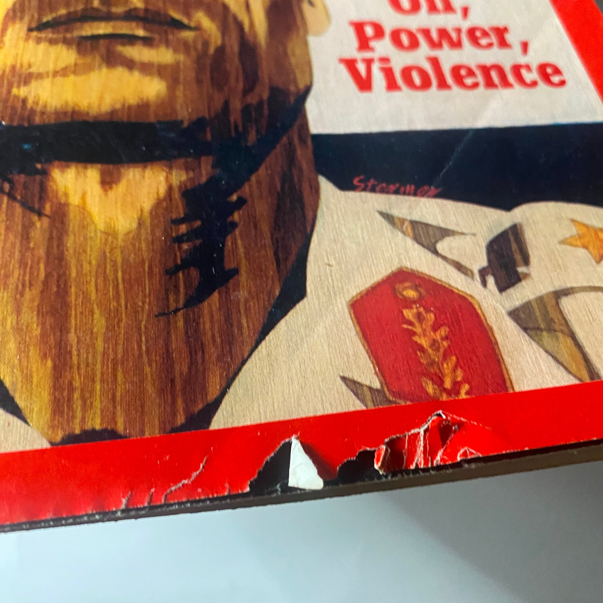 Close-up of the cover of VTG Time Magazine April 2 1973 showing a corner damage and the title 'The Arabs: Oil, Power, Violence' featuring Libya's Muammar Gaddafi.