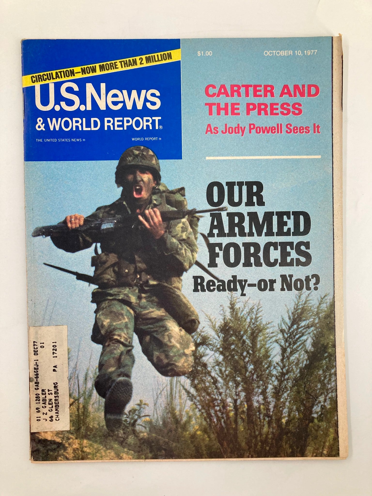 Cover of US News & World Report Magazine, dated October 10, 1977, featuring a soldier in military gear and the title 'Our Armed Forces: Ready or Not?' This vintage magazine explores military readiness during a significant period in American history.