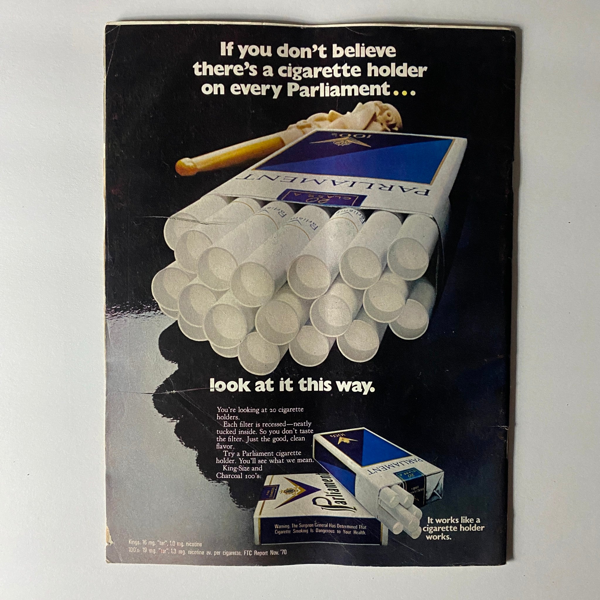 Vintage advertisement from Time Magazine August 16, 1971 featuring a stack of Parliament cigarettes and the slogan about cigarette holders. This ad is part of the issue showcasing George Shultz and Arthur Burns.