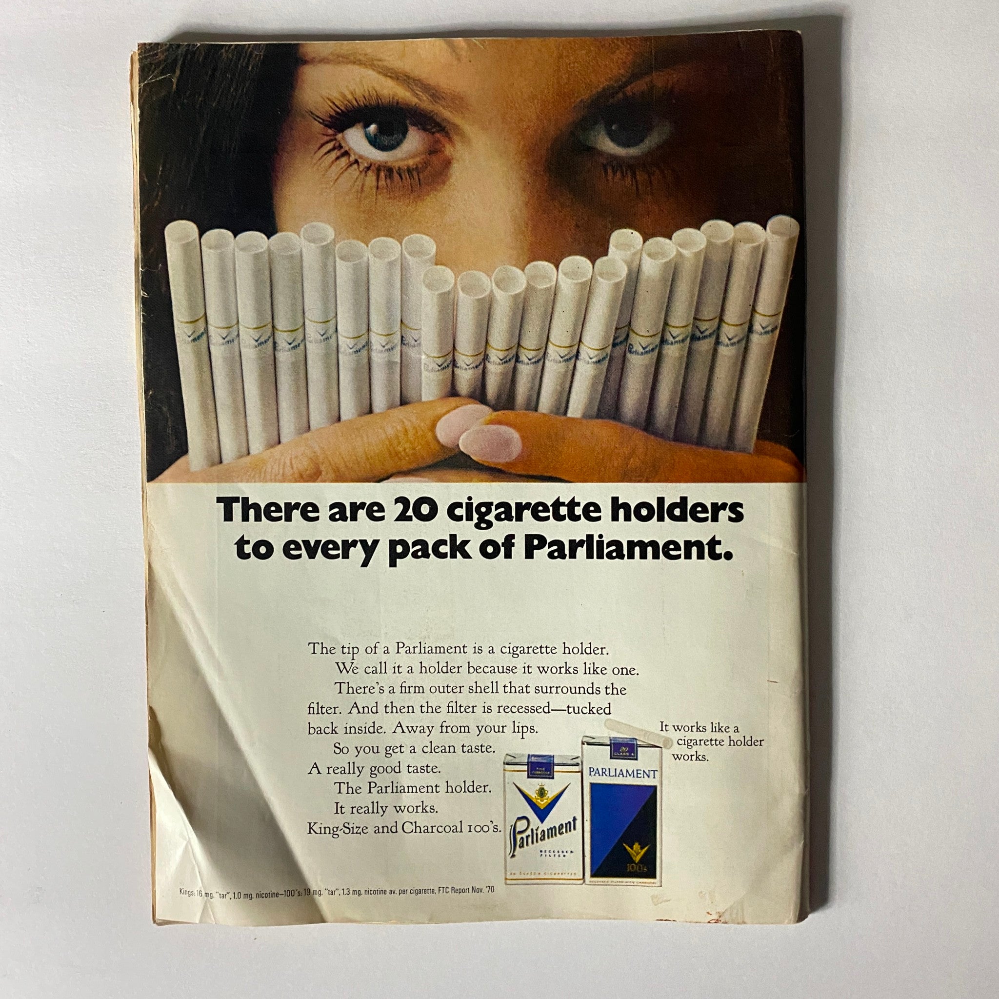 Back cover of the VTG Time Magazine June 7 1971 showcasing a vintage cigarette advertisement for Parliament featuring a model holding multiple cigarette holders.