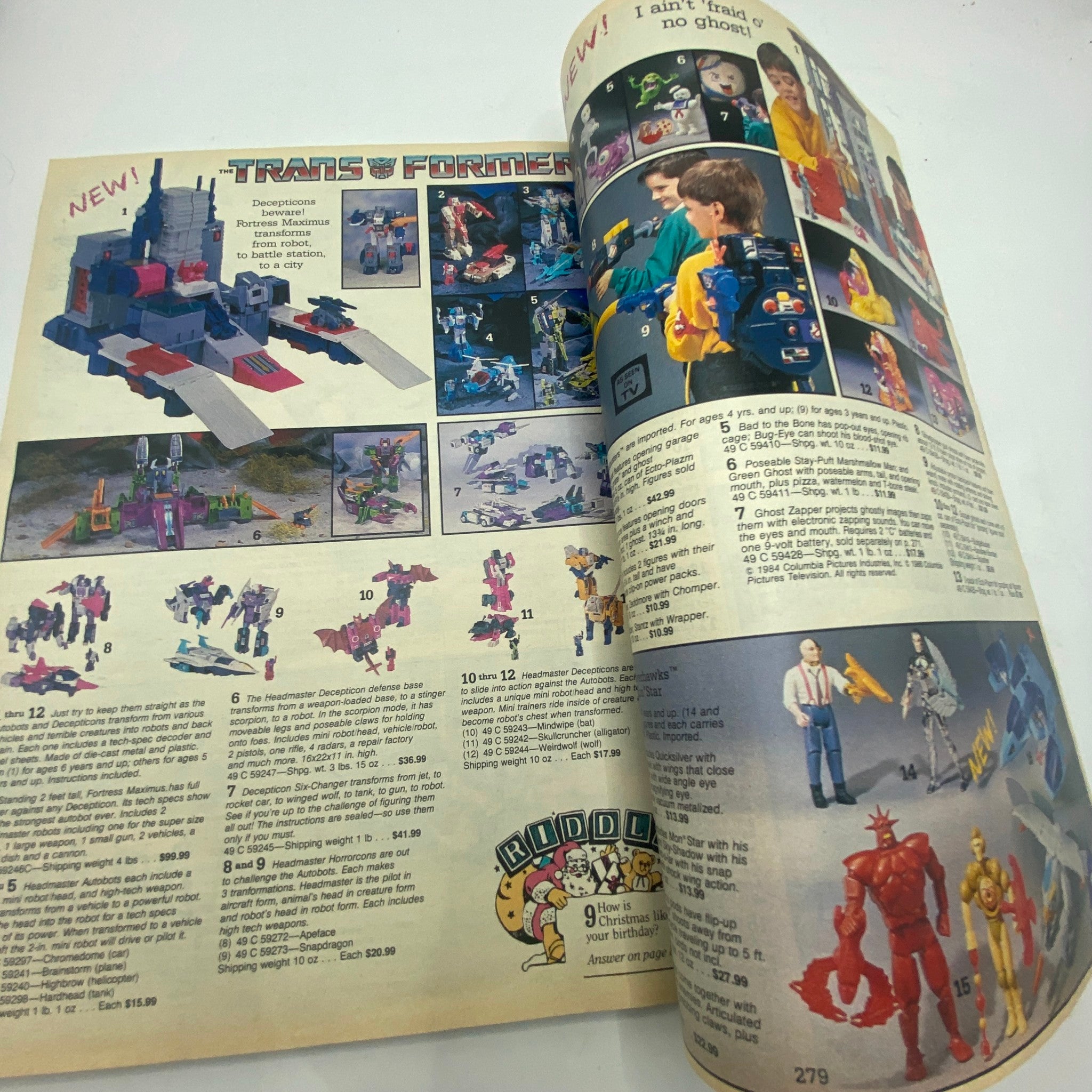 Interior page of the 1987 Sears Wish Book for Kids highlighting Transformers toys, including product images and descriptions.