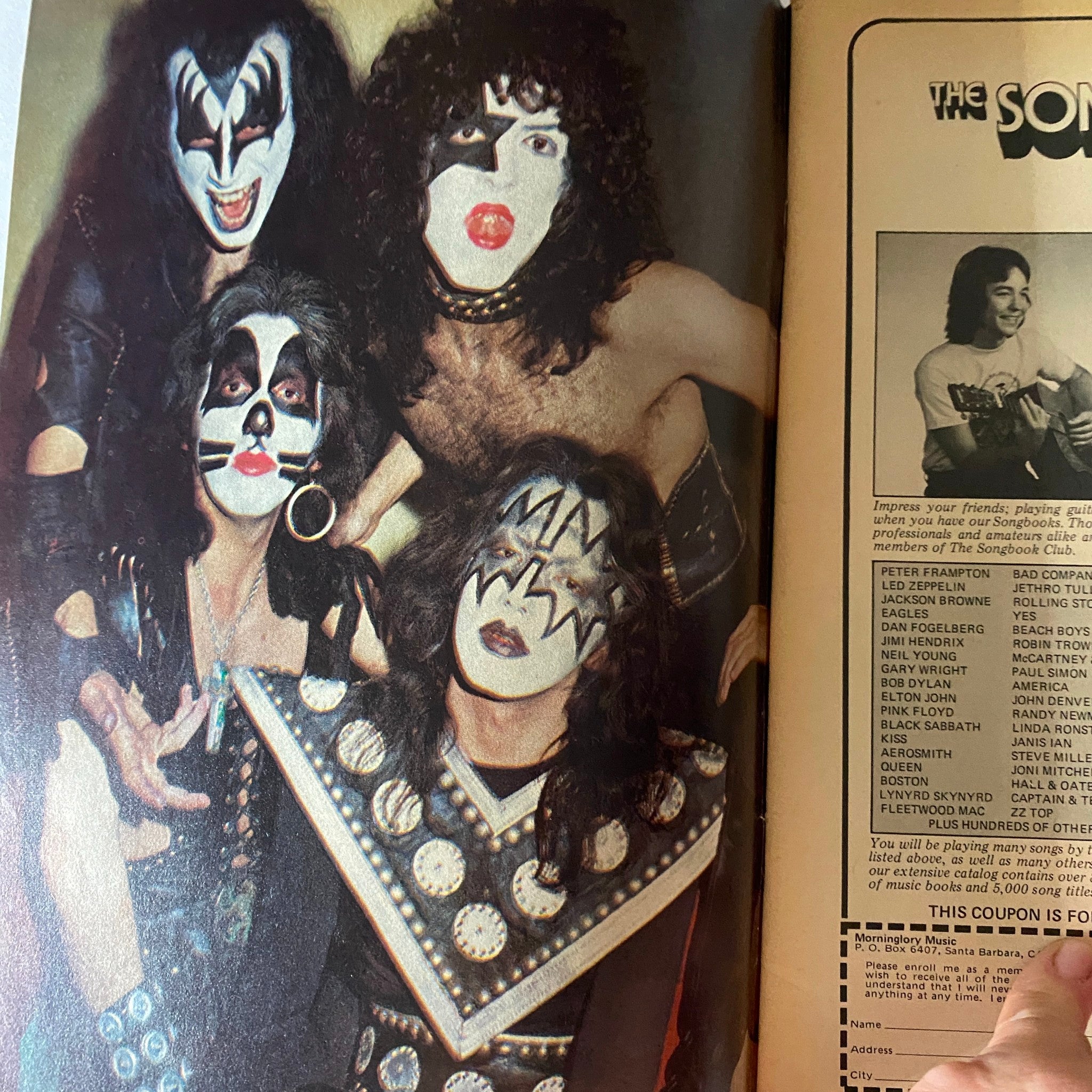 Inside view of the VTG Hit Parader Magazine Winter 1977-1978 Annual with a photo of the band Kiss, highlighting their distinctive stage makeup and costumes.