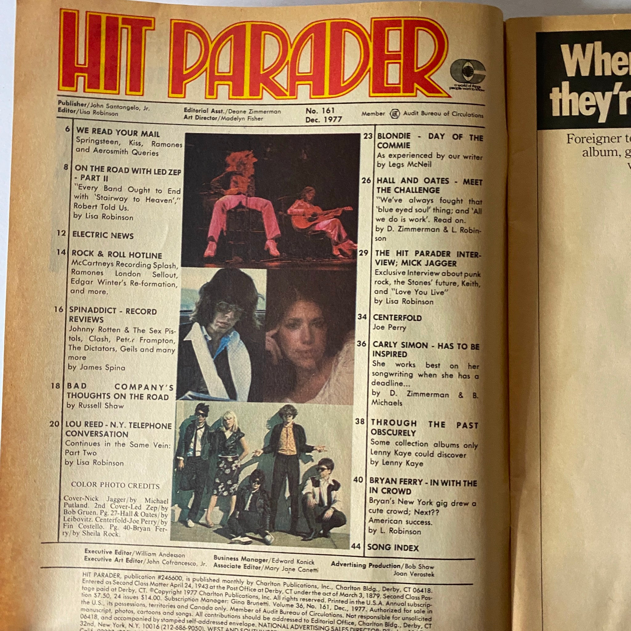 Inside page of Vintage Hit Parader Magazine from December 1977 showcasing table of contents, including interviews and features on Mick Jagger, Carly Simon, and Joe Perry.