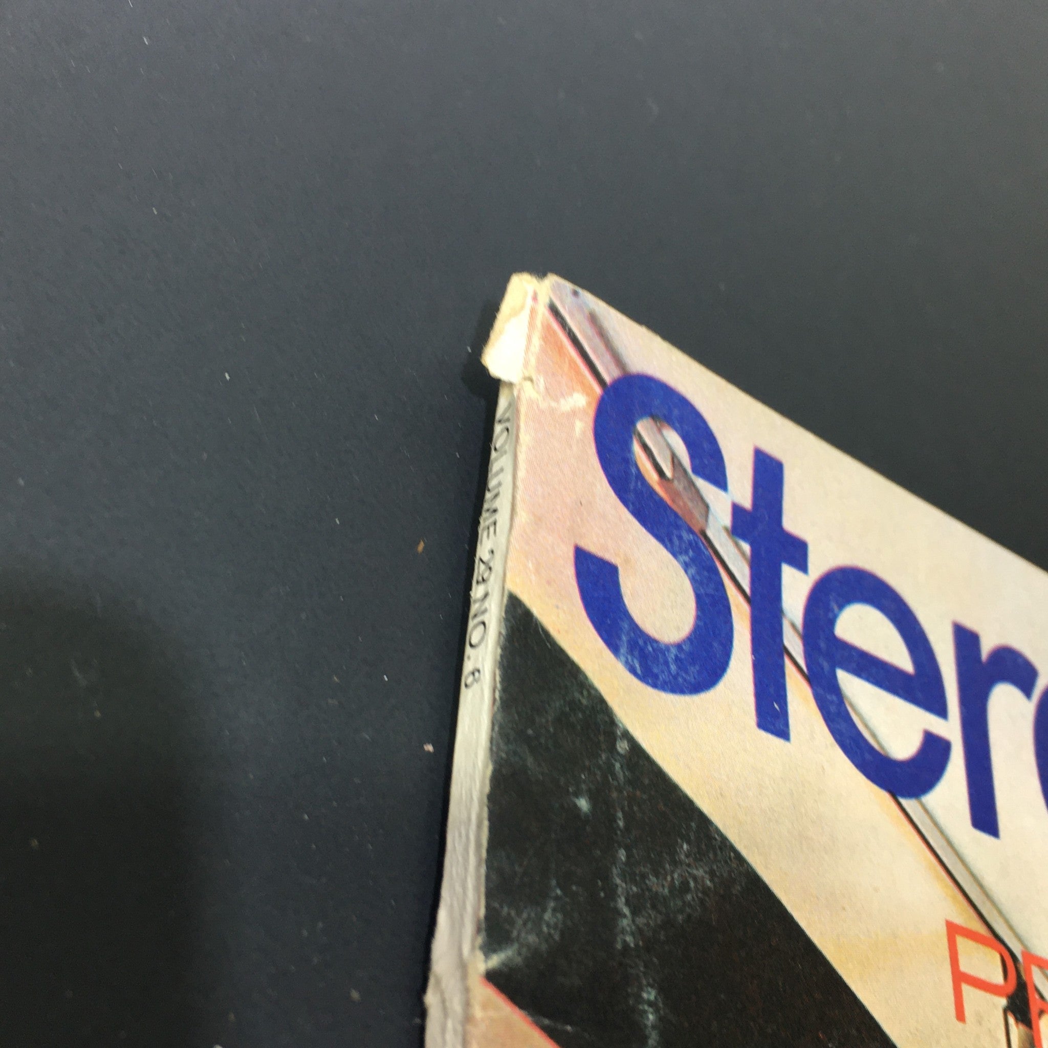 Close-up image of the edge of the VTG Stereo Review Music Magazine from December 1972, showcasing wear and tear while highlighting its vintage condition and historical significance.