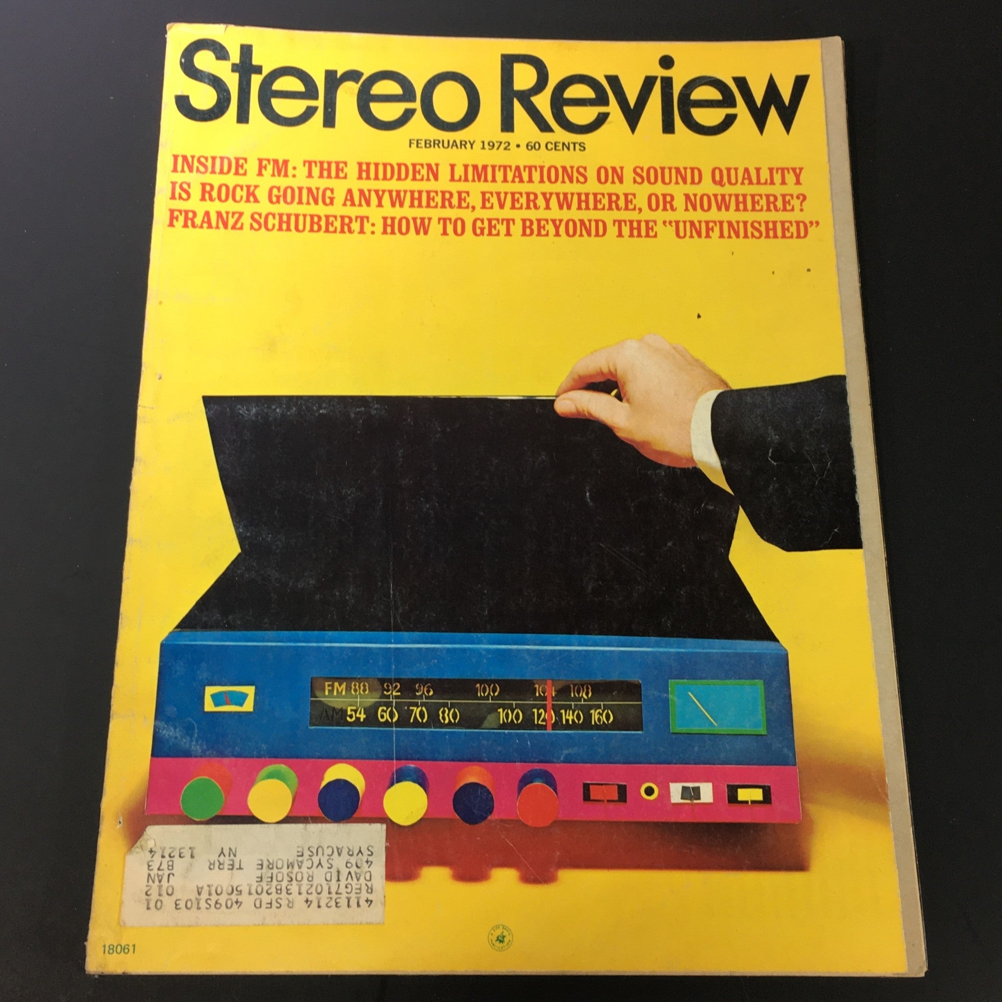 Vintage Stereo Review Music Magazine from February 1972 featuring an illustration of a hand reaching for a colorful stereo, with articles highlighting Franz Schubert and sound quality.