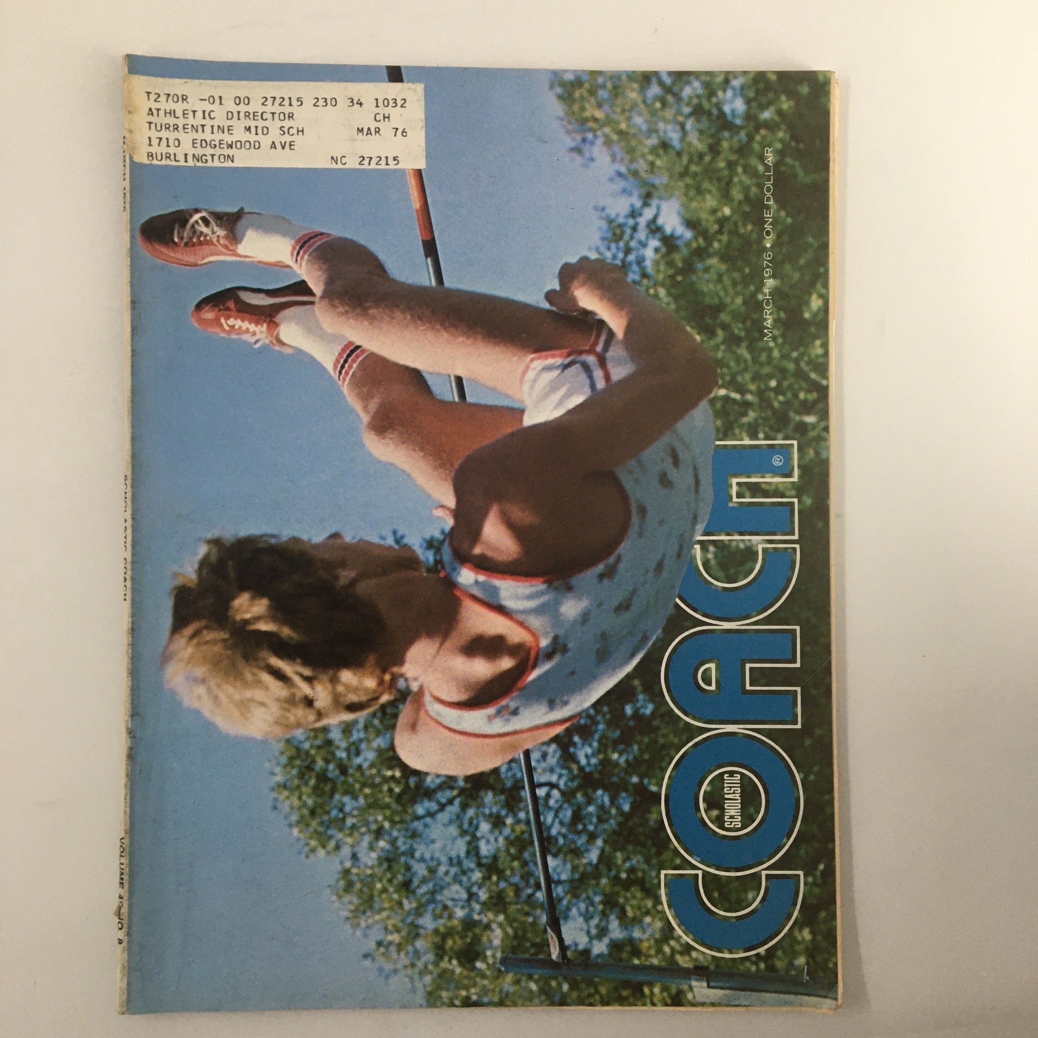 Cover of VTG Scholastic Coach Magazine March 1976 featuring Dwight Stones, showcasing a dynamic pole vaulting action with an athlete in mid-air.