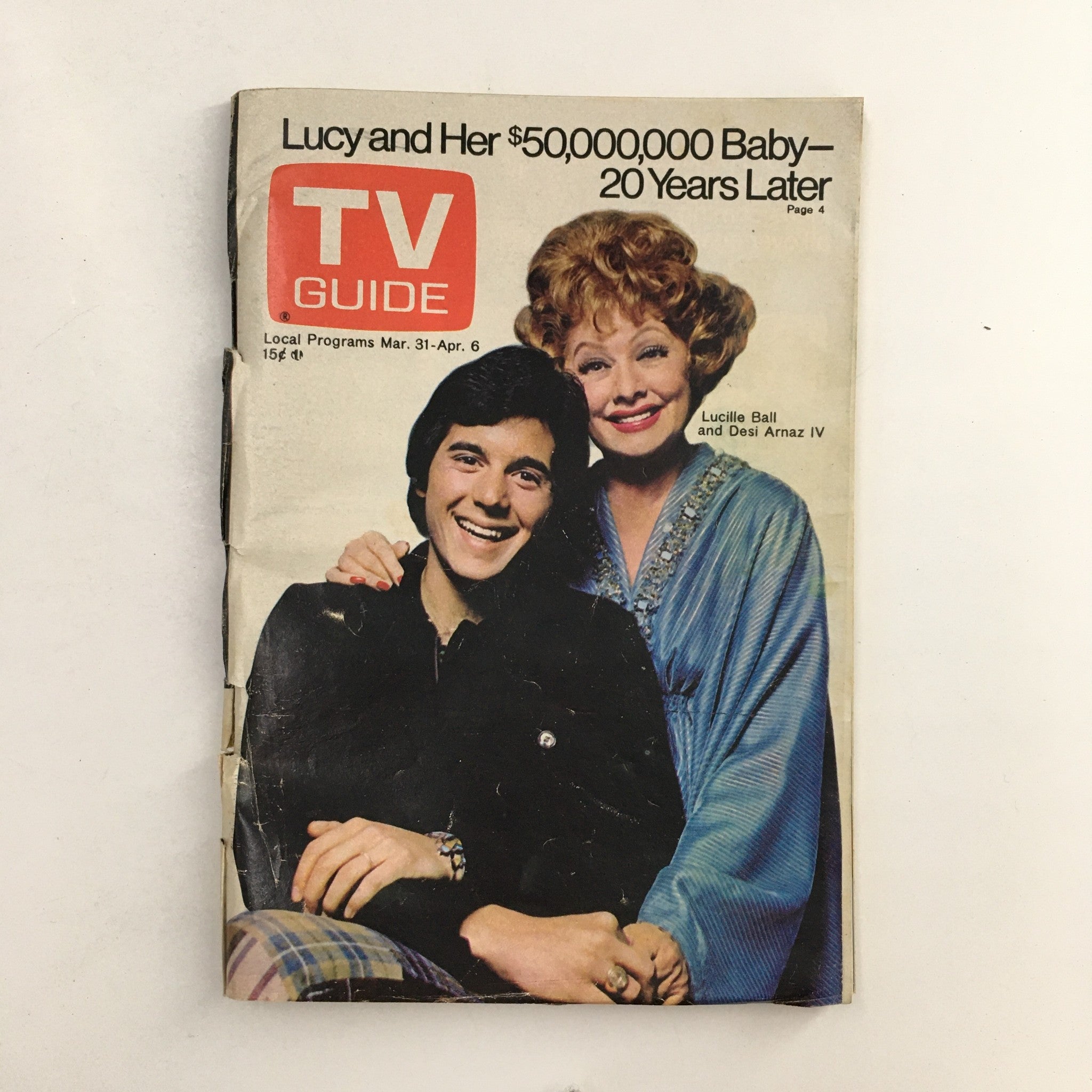 TV Guide Magazine March 31 1973 cover featuring Lucille Ball and Desi Arnaz IV. The cover highlights their reunion, with a colorful design and bold text, ideal for vintage TV memorabilia.