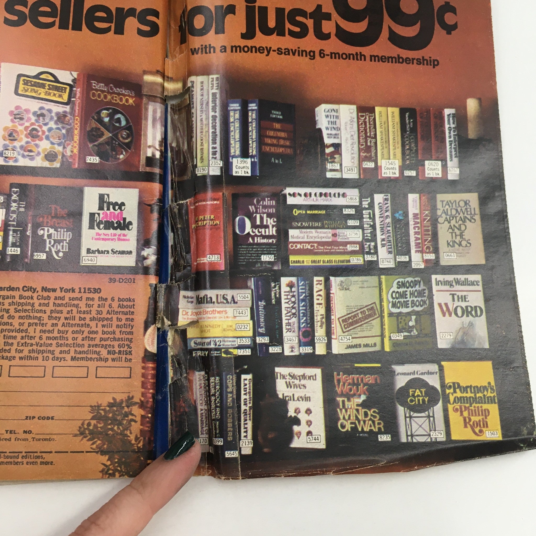 Inside view of TV Guide Magazine from March 31, 1973, showcasing various book advertisements featuring best sellers and promotional offers.