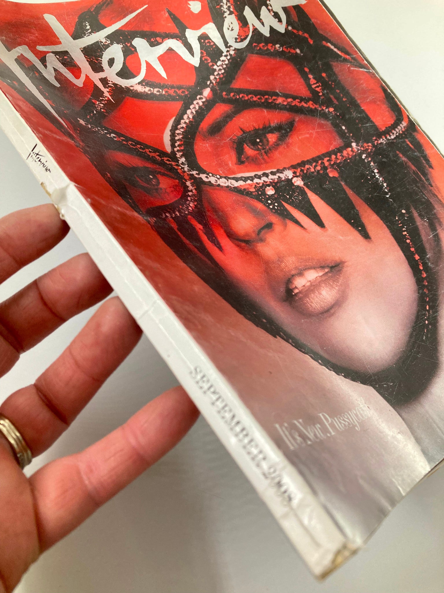 Cover of Interview Magazine September 2008 featuring Kate Moss, showcasing a vibrant design that highlights the essence of 2000s fashion and pop culture titled 'It's New Pussycat'.