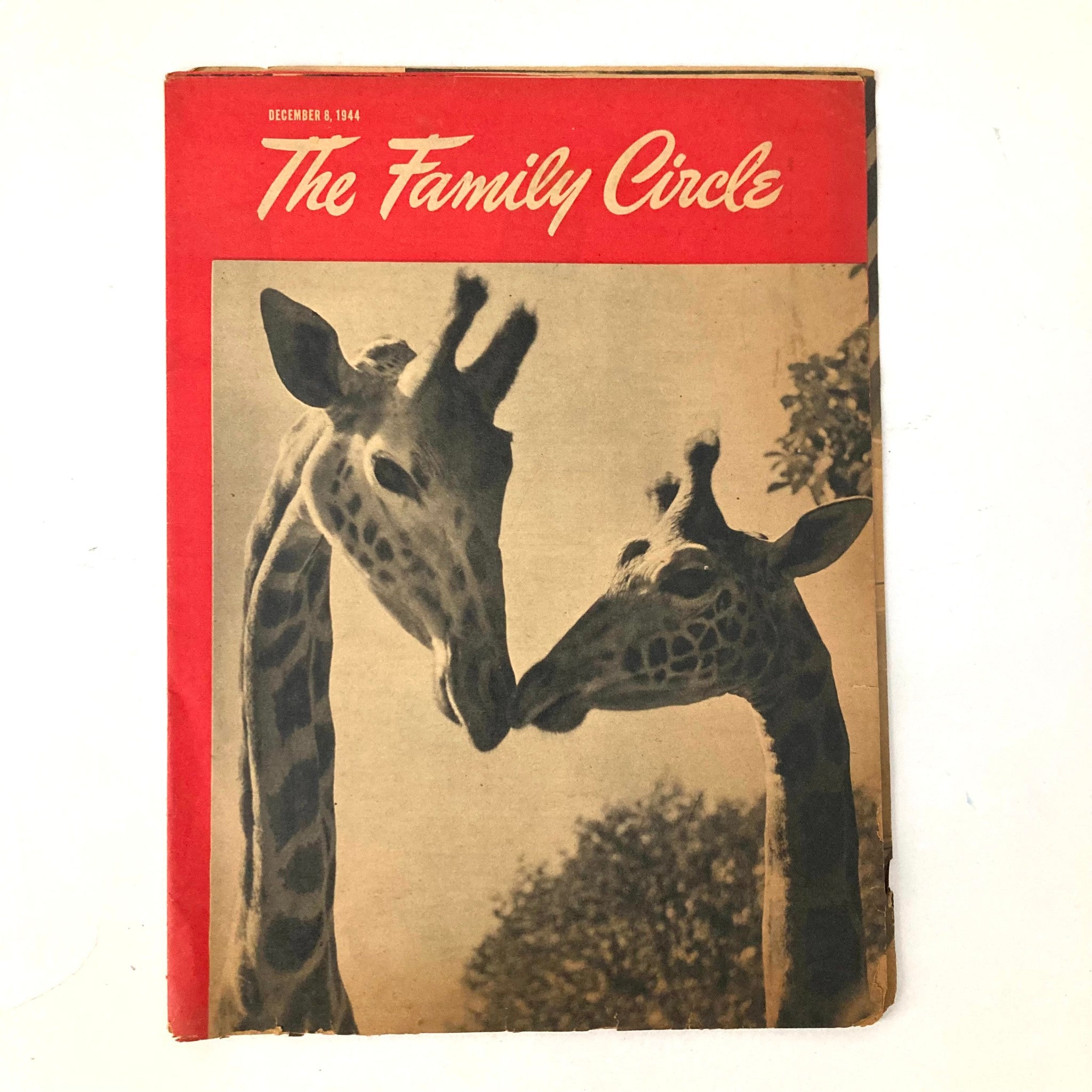 VTG The Family Circle Magazine, December 8, 1944, featuring a cover with two giraffes in a tender pose, representing the warmth of post-war culture.