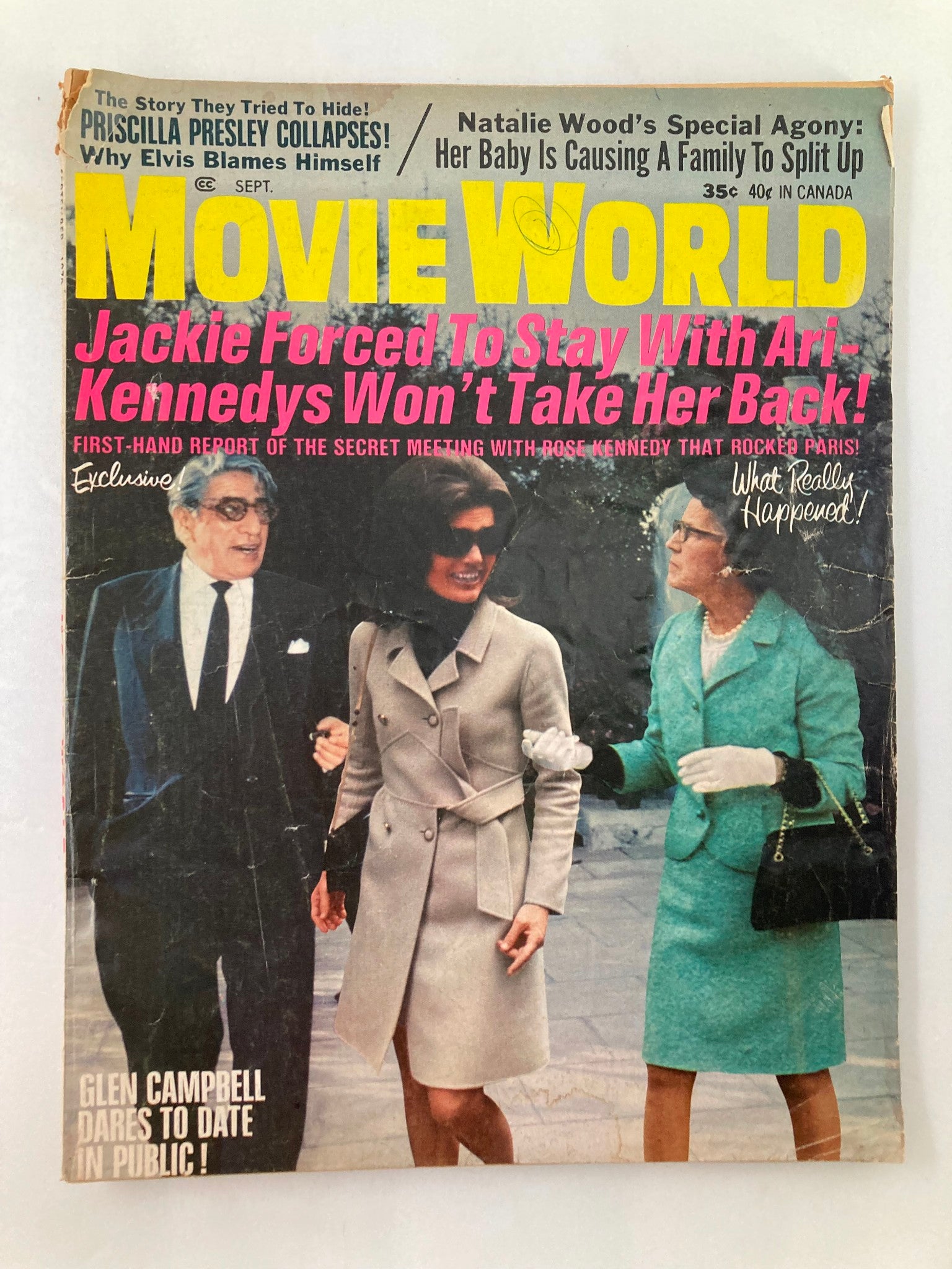 Vintage Movie World Magazine September 1970 Vol 15 #9 featuring Jackie and Aristotle on the cover, showcasing their iconic styles and notable headlines about Hollywood events.