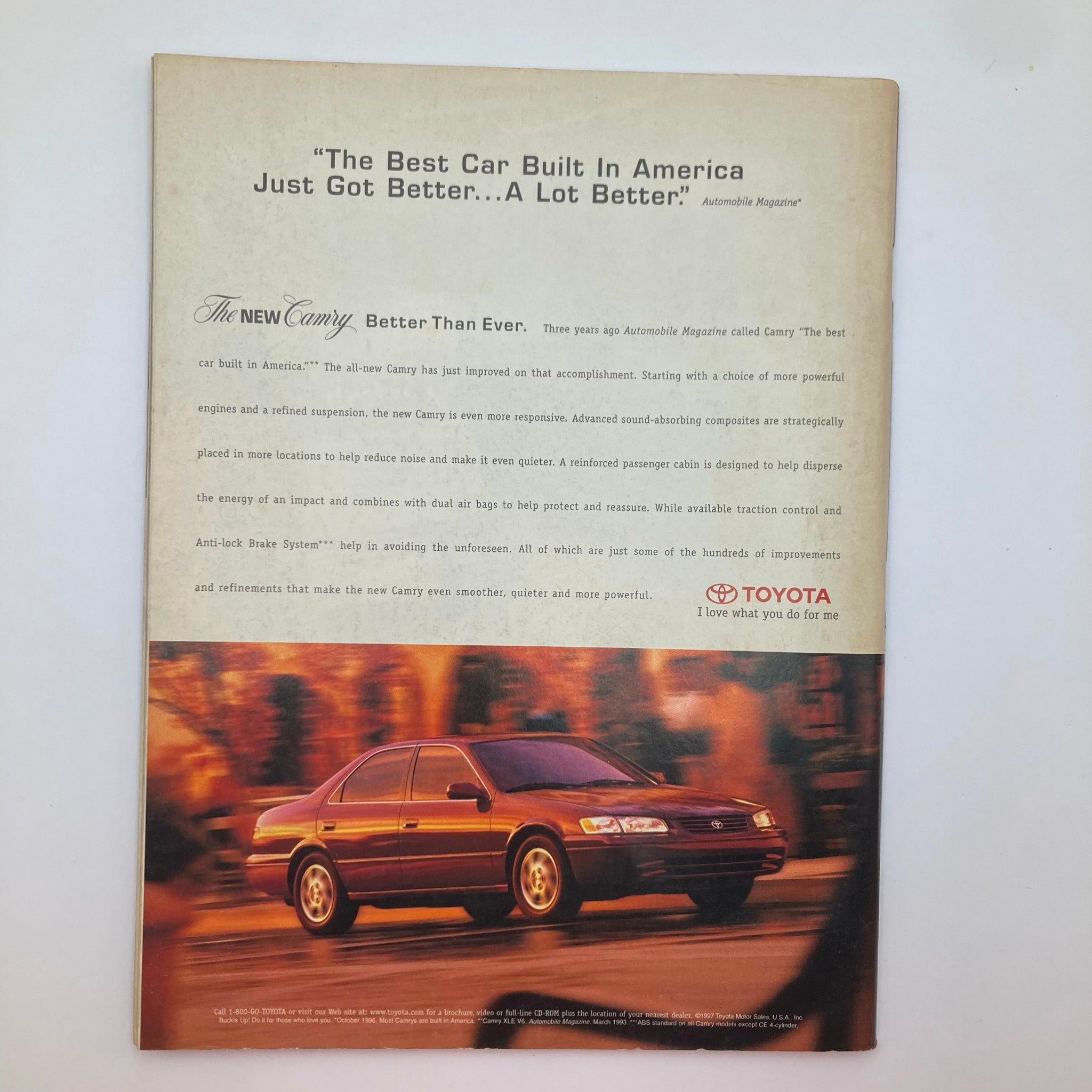 Back cover of People Weekly Magazine August 25 1997 displaying an advertisement for the new Toyota Camry. The ad highlights features of the vehicle with a scenic background, emphasizing improvements in the car's performance and safety.