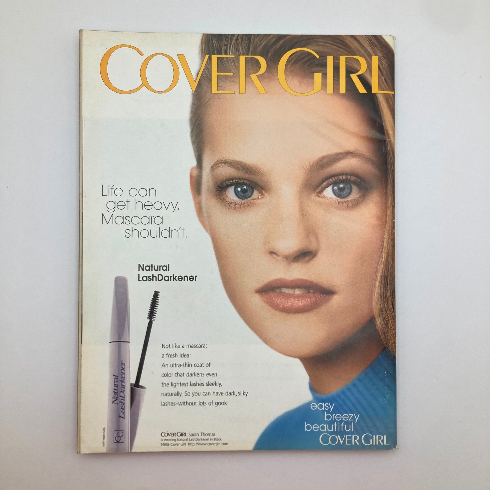 Cover of Cover Girl magazine featuring the tagline 'Life can get heavy. Mascara shouldn't.' promoting Natural LashDarkener.