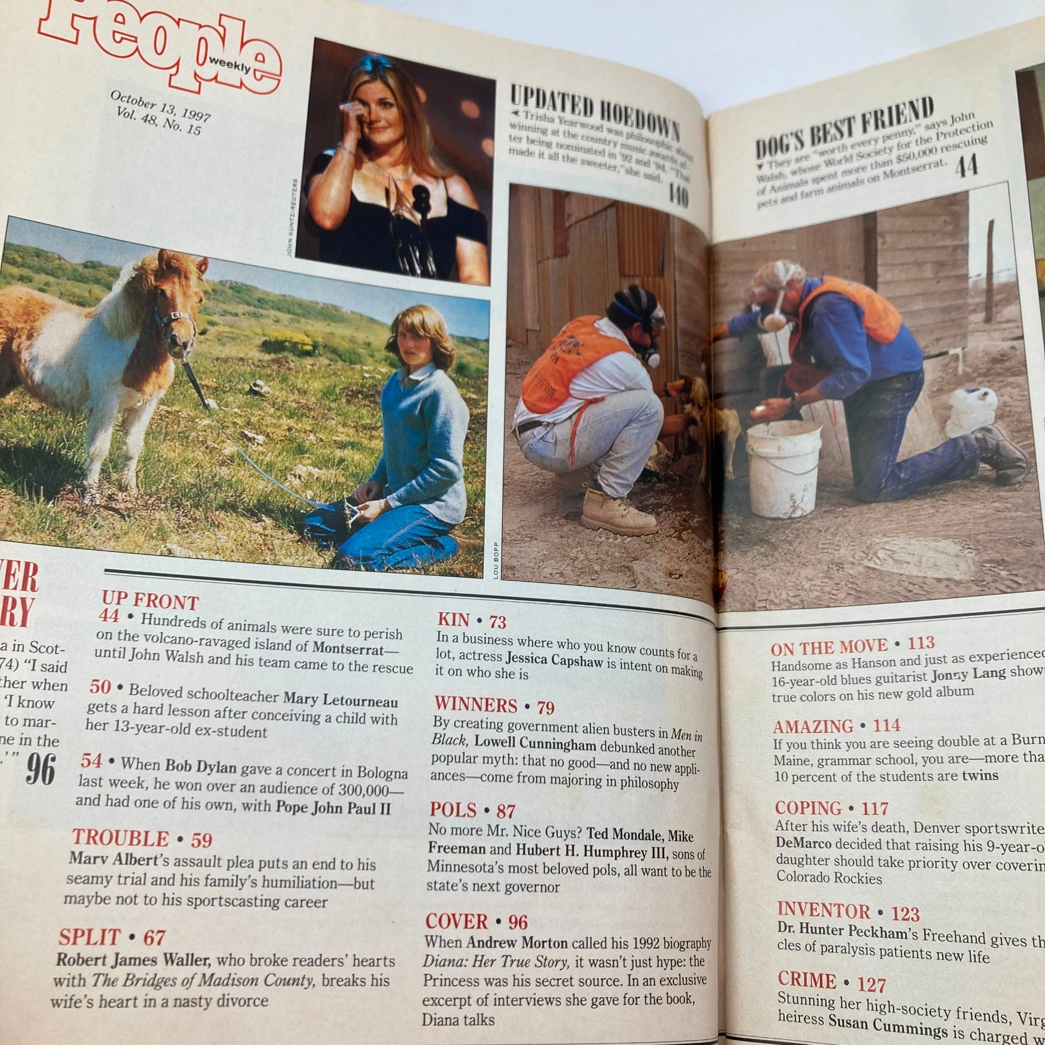 Inside pages of People Weekly Magazine from October 13, 1997, showcasing various articles, including segments on animals, celebrities, and notable events.