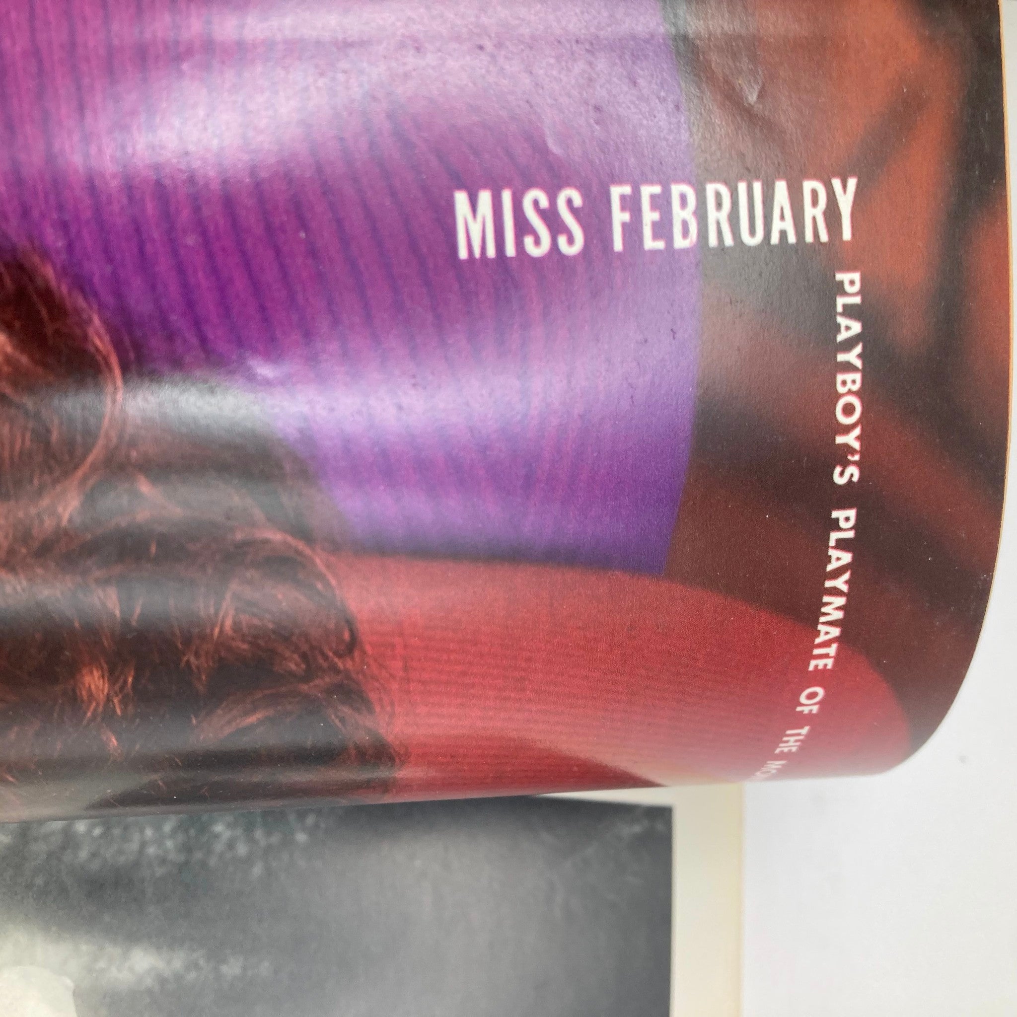 Inside spread of VTG Playboy Magazine February 1975 highlighting Miss February, featured as Playboy's Playmate of the Month.