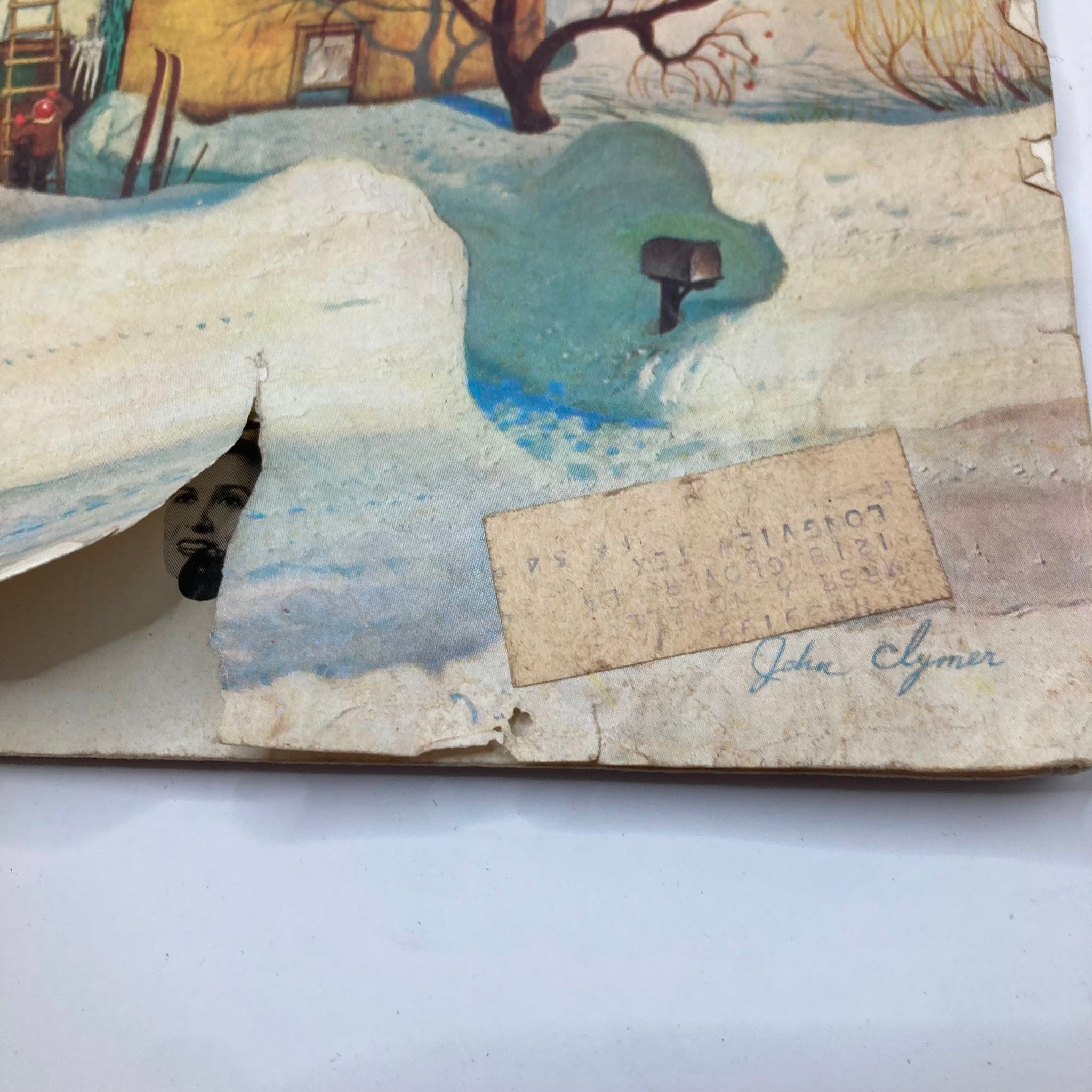 Damaged cover of the Saturday Evening Post Magazine from January 23, 1954 featuring snow artwork by John Clymer.