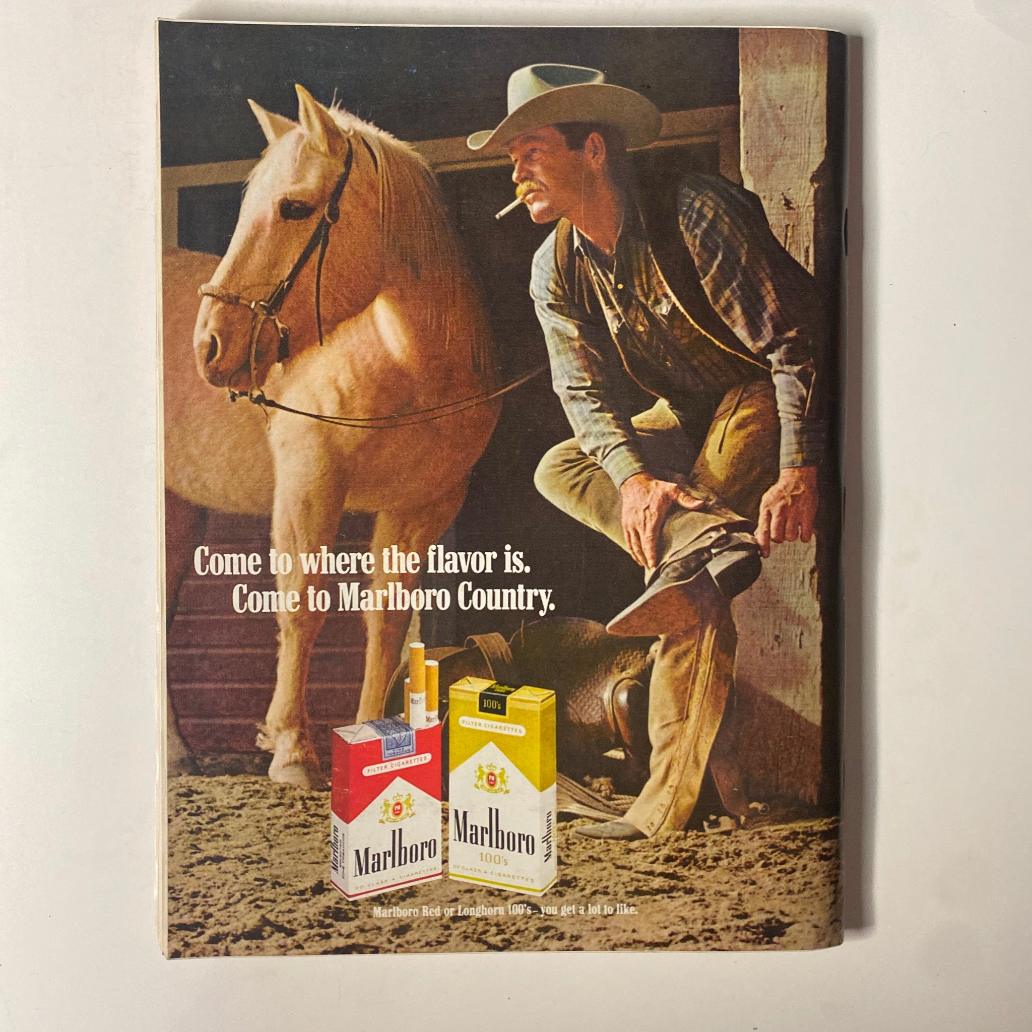 Back cover of Playboy Magazine September 1969 displaying a Marlboro advertisement featuring a cowboy and horse, promoting Marlboro Country.