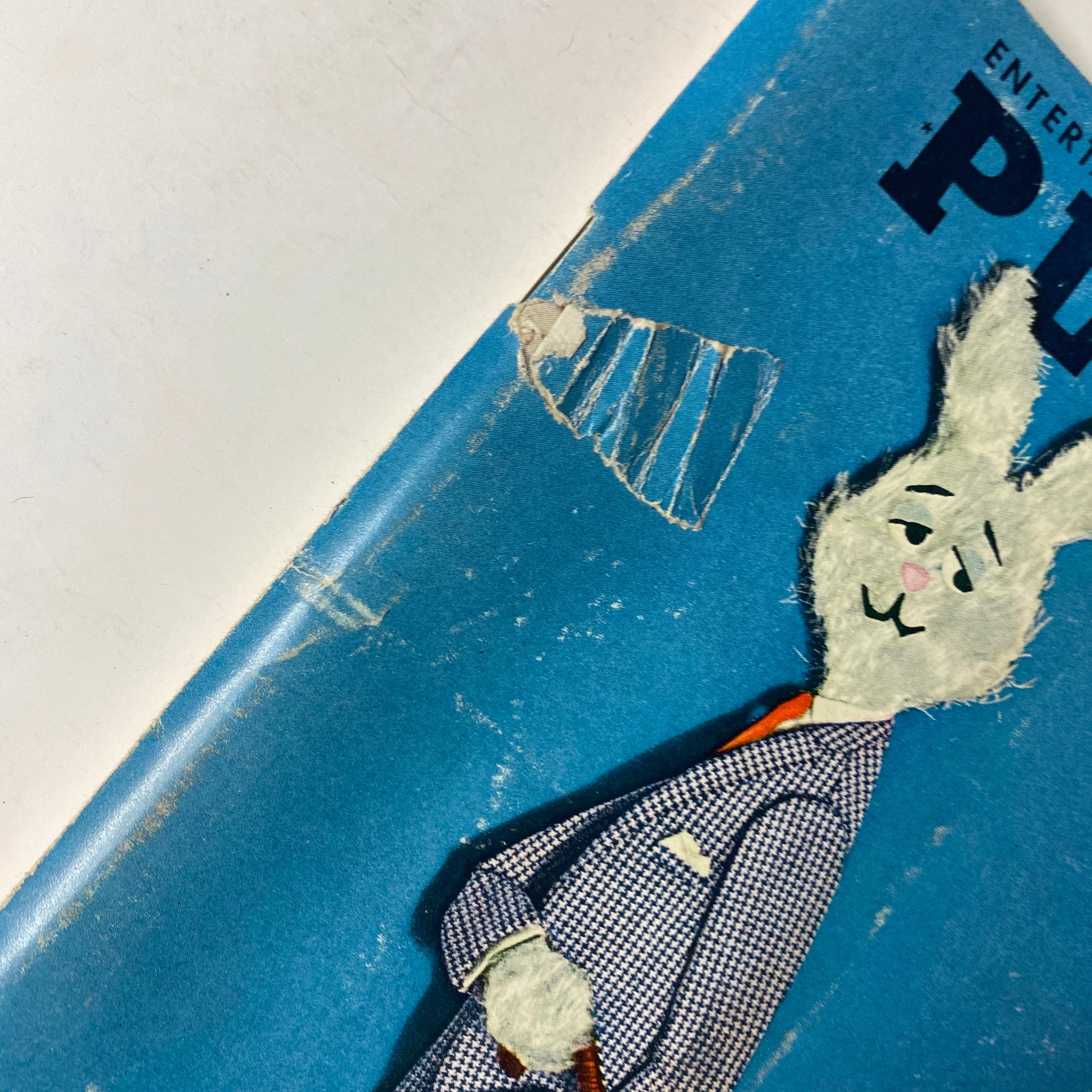 Cover detail from Playboy Magazine June 1964 featuring an artistic rabbit illustration and a damaged corner, showcasing vintage magazine wear.